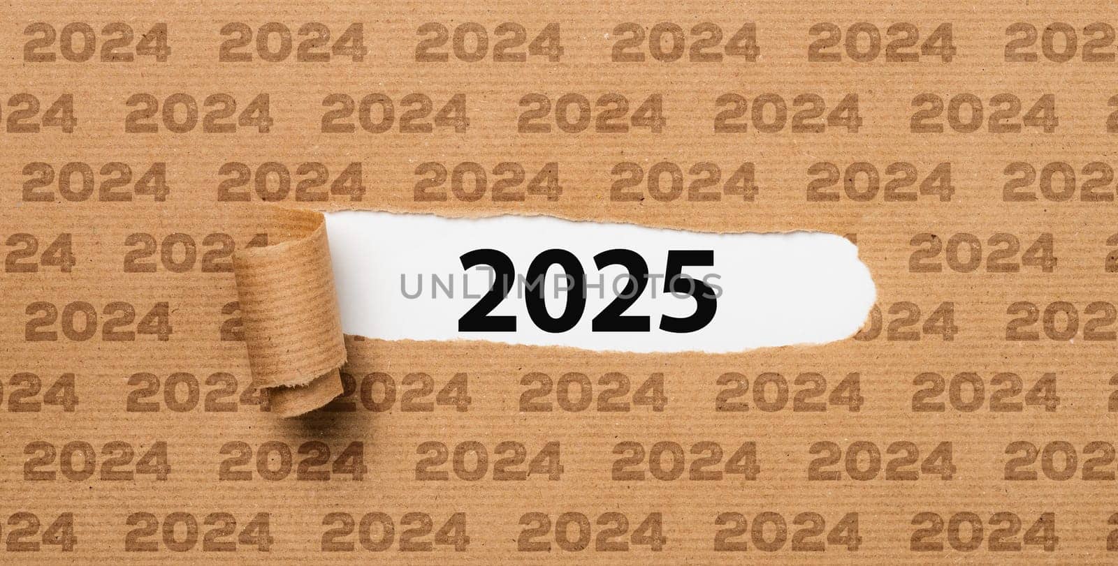 Torn paper revealing the number 2025