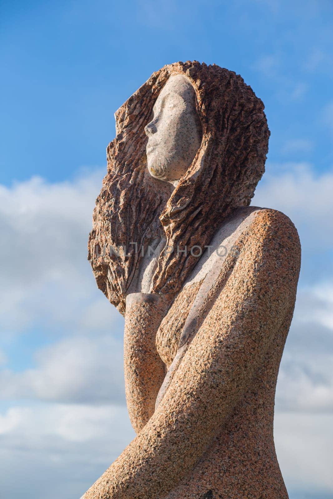 Carnoët, Bretagne, France - March 22th 2017 : Granite statue of Riwanon in the Valley of the Saints