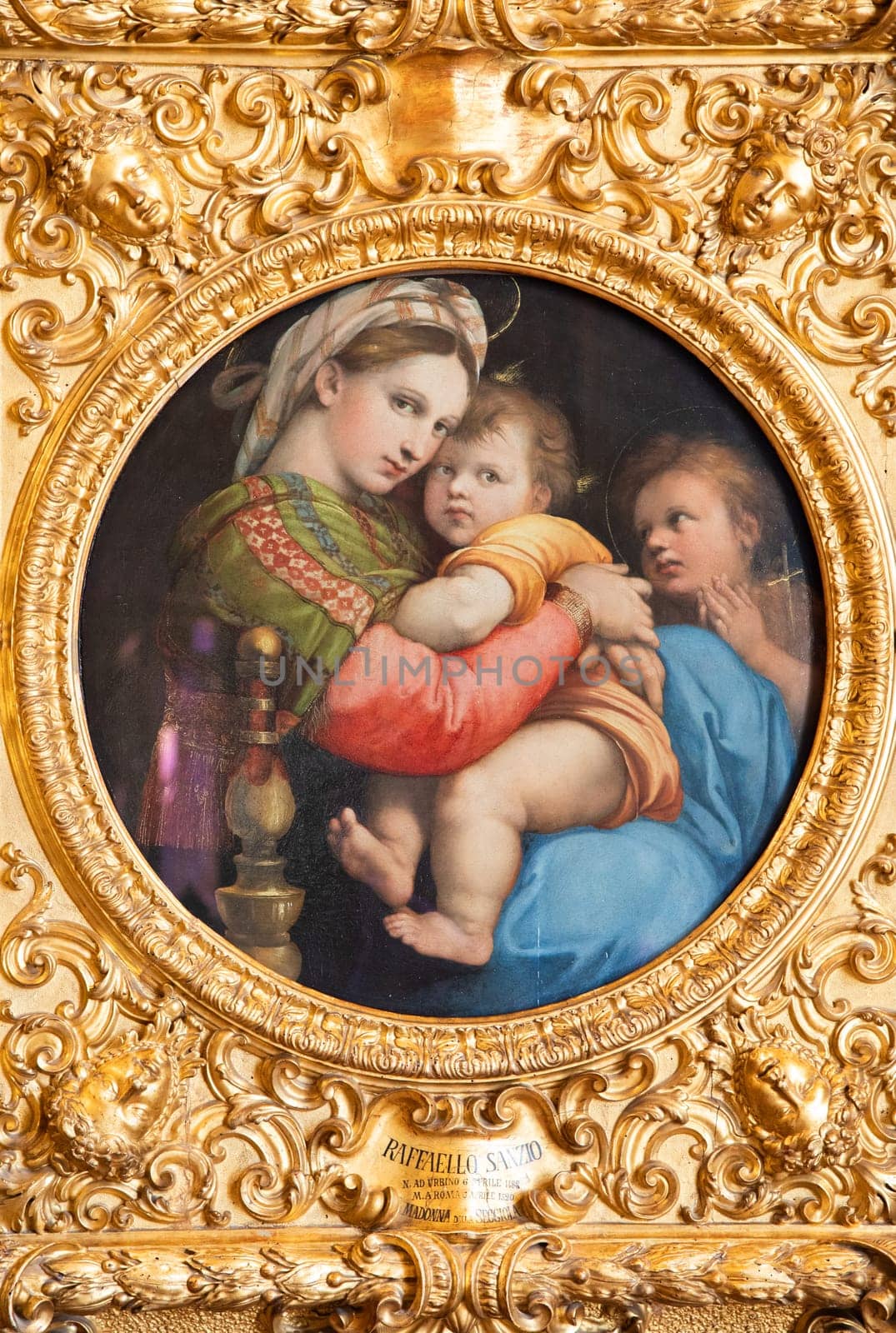 Florence, Italy - 27 June 2023: The Madonna of the Chair, named Madonna della Seggiola, by Raffaello Sanzio, named Raphael, executed c. 1513