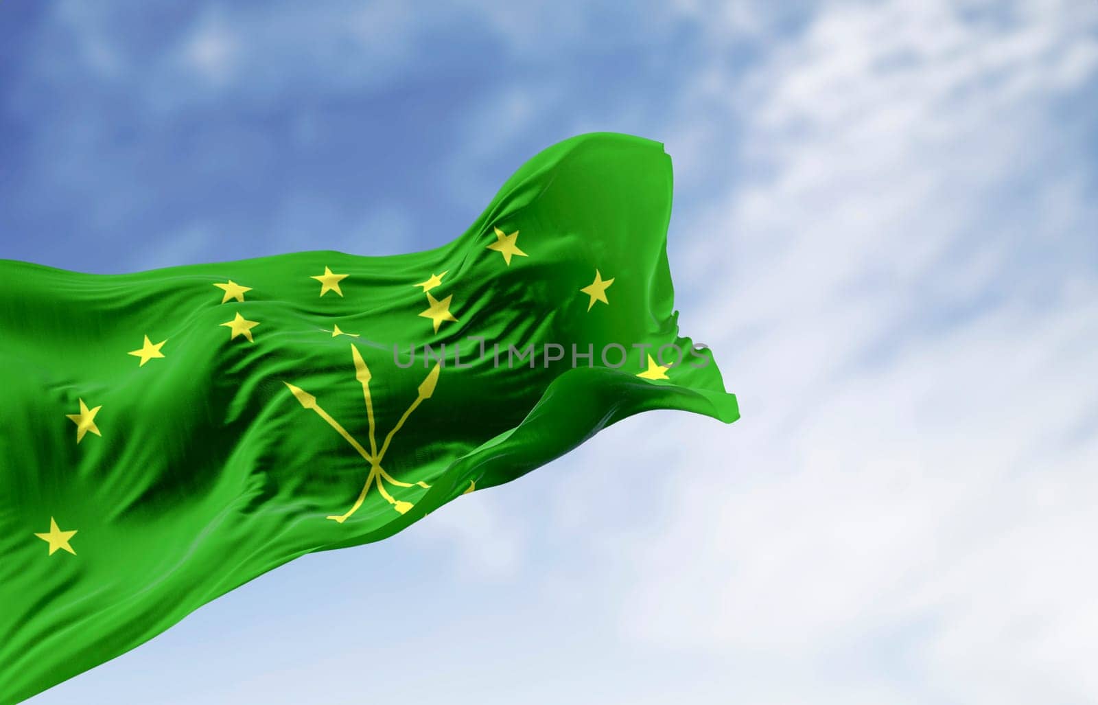 The Circassian flag waving in the wind on a clear day. National flag of Republic of Adygea. Russian Federation. 3d illustration render. Fluttering fabric