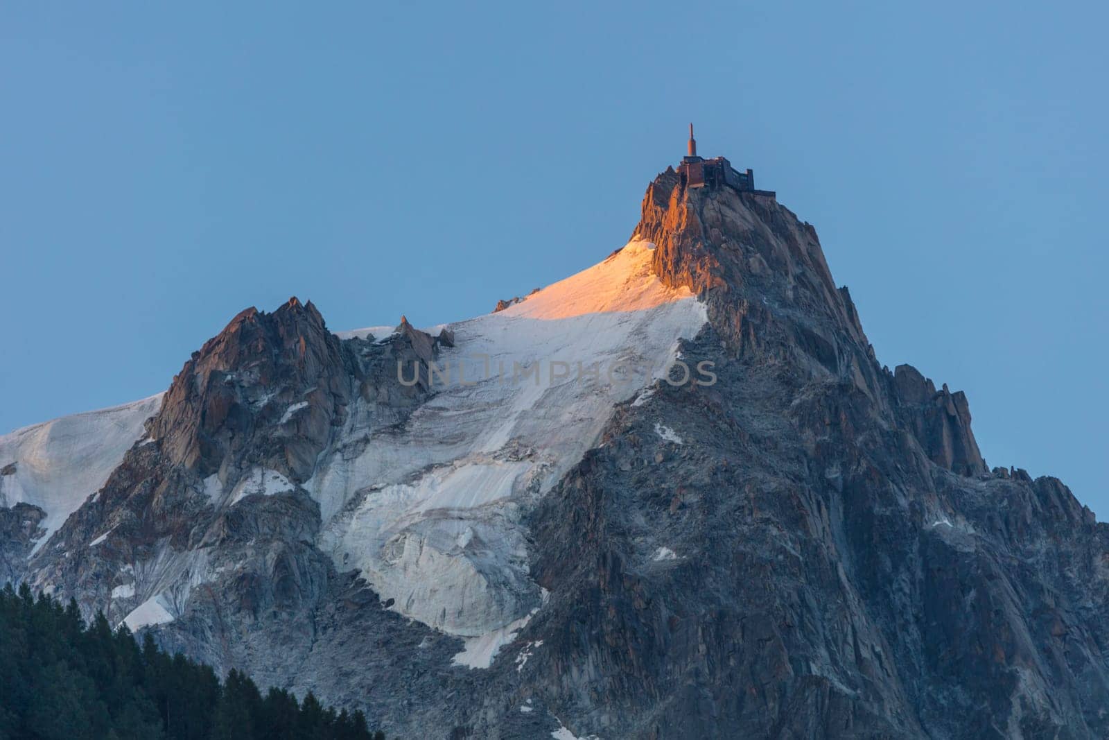 L'Aguille du Midi in sunrise. View from Chamonix, France