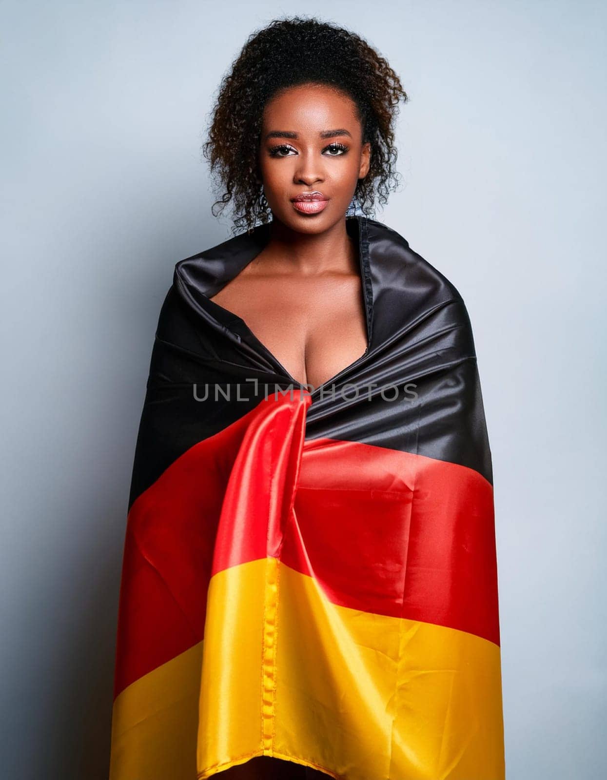 pretty young woman wrapped in flag of Germany, AI generated image