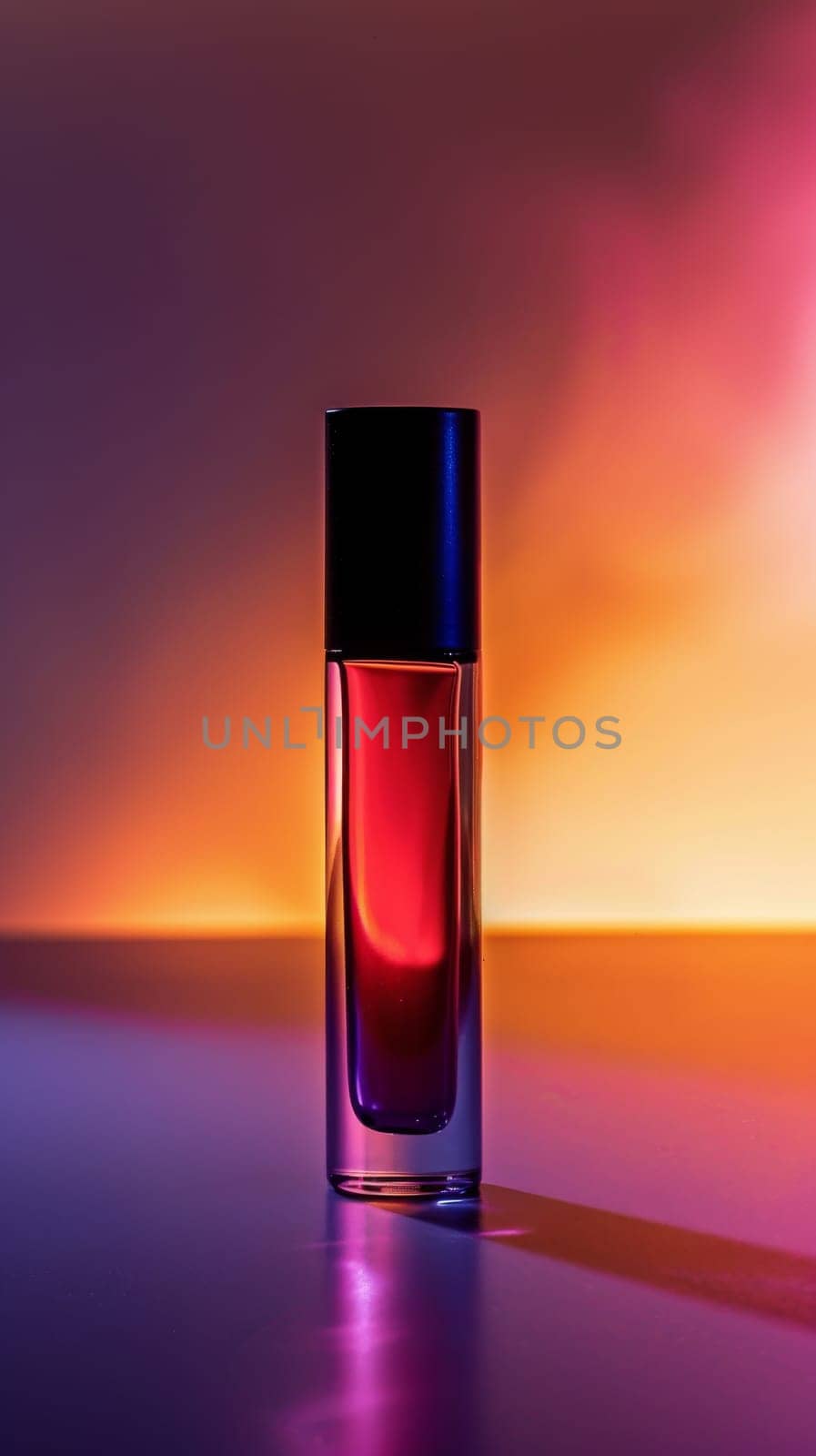 Captivating silhouette of a lip gloss tube with glossy reflections.