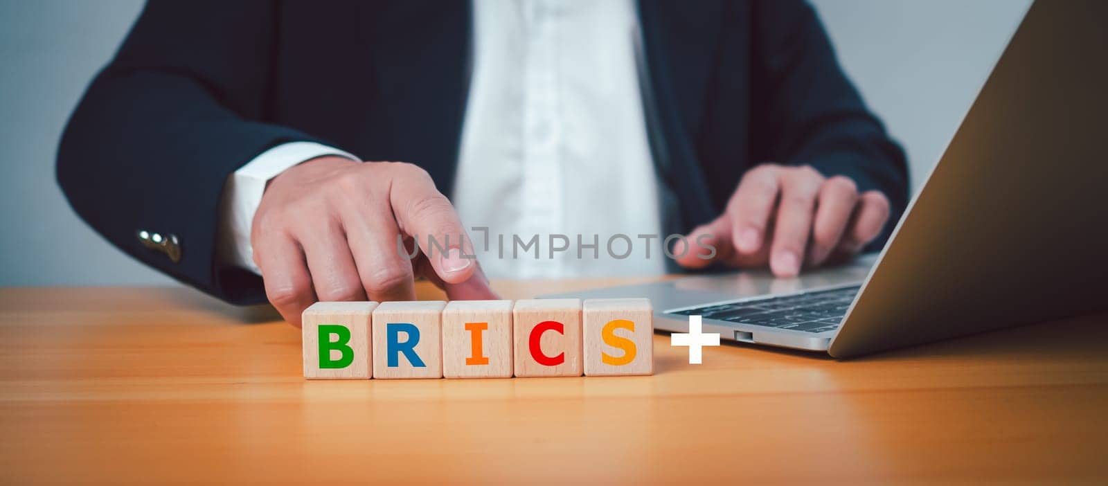 BRICS economic business international cooperation concept, Wooden cube block at print screen letters Brics represent a group of countries with rapidly developing economies.