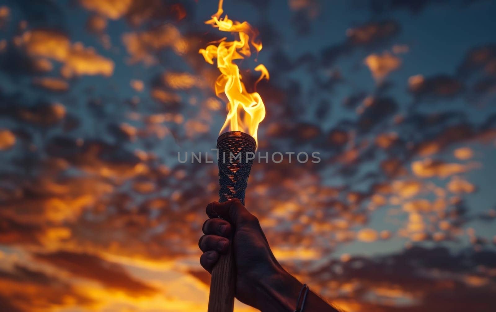 An intense, flickering torch flame stands out against a turbulent, storm-filled sky, creating a powerful and evocative scene of light, energy and the forces of nature