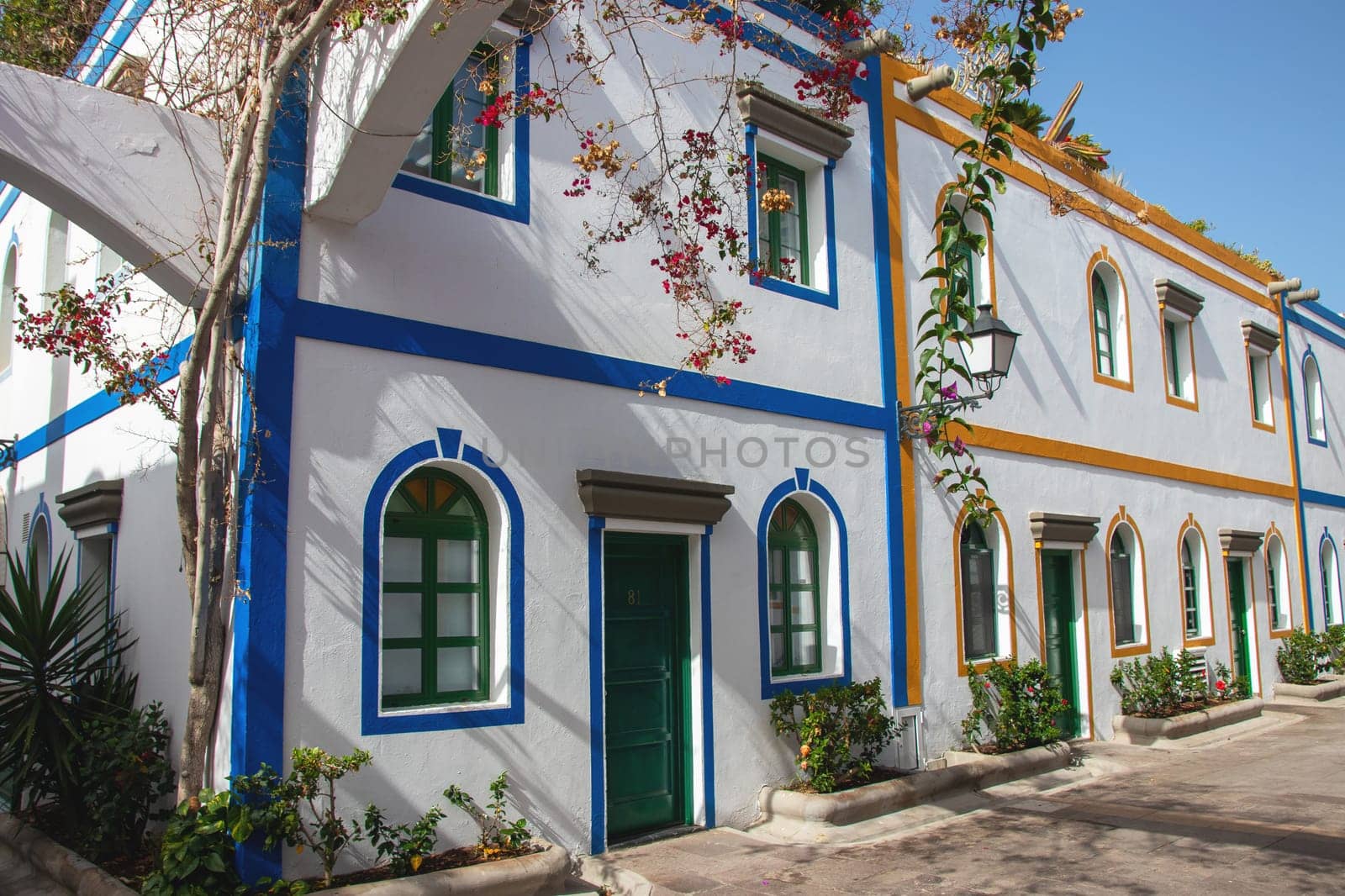Gran Canaria, Spain, Jul 18, 2024. Puerto de Mogan, also called little Venice, with a small fishing harbour, romantic alleys and beautiful architecture. Popular town with shopping facilities, restaurants and pubs.