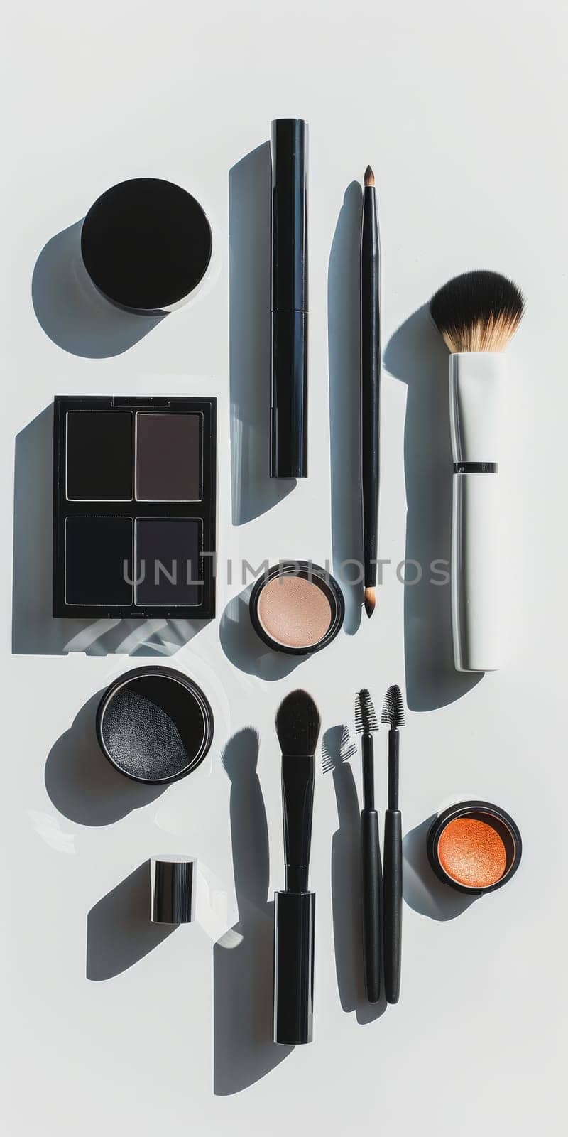 Artful arrangement of makeup products in a minimalist style, focusing on quality over quantity.