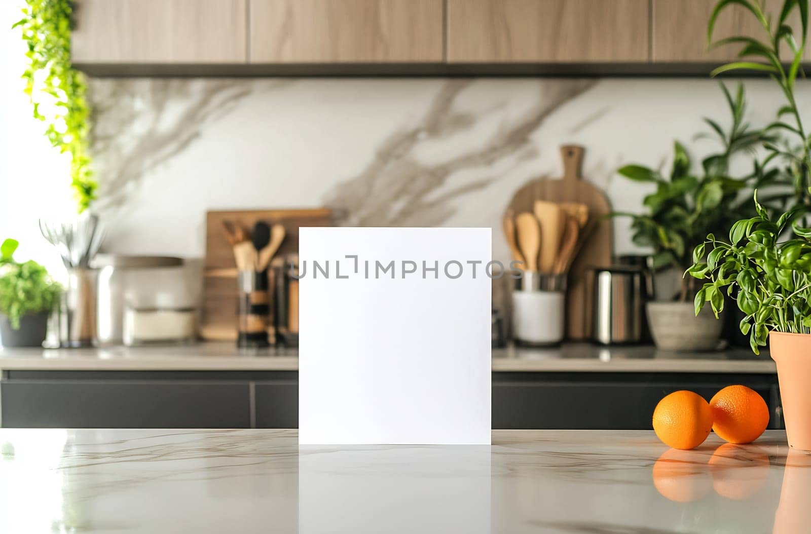 A modern kitchen features a blank white canvas on the counter, surrounded by fresh fruits and greenery, creating a serene atmosphere.