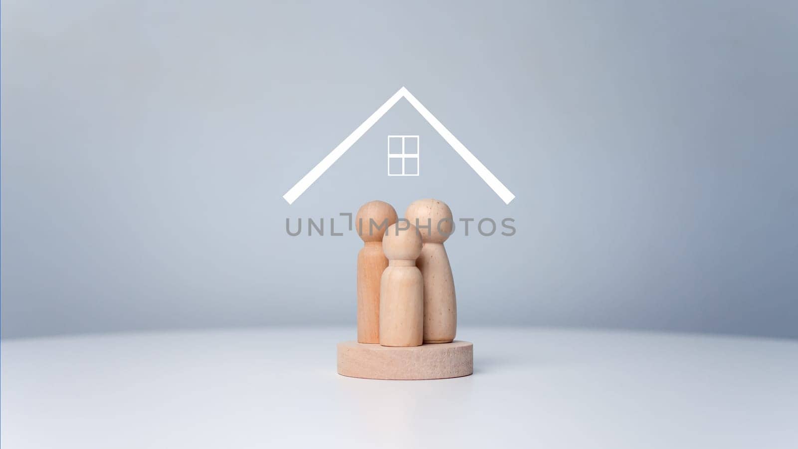 Human wood model with protecting glowing family assurance life and health concept, Life and health insurance. Home insurance for grandchildren, People lifestyles and Relationships in love concept.