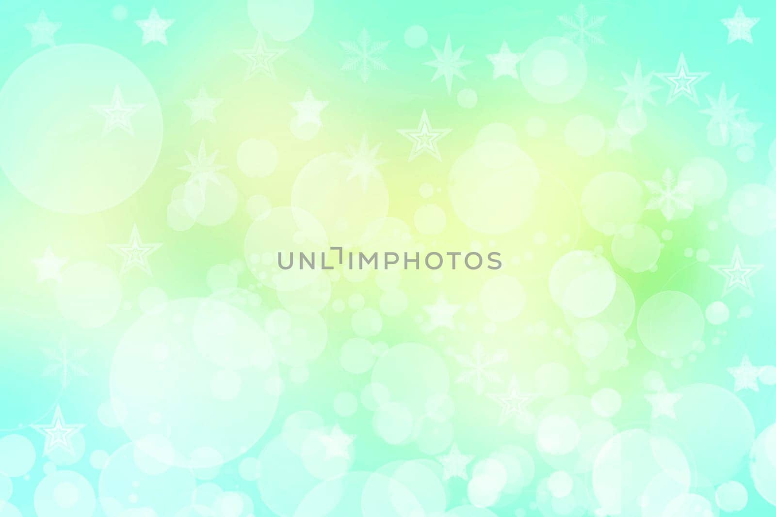 A festive abstract delicate Happy New Year or Christmas background texture with colorful yellow turquoise green blurred bokeh lights and stars. Space for design. Card concept or advertising.