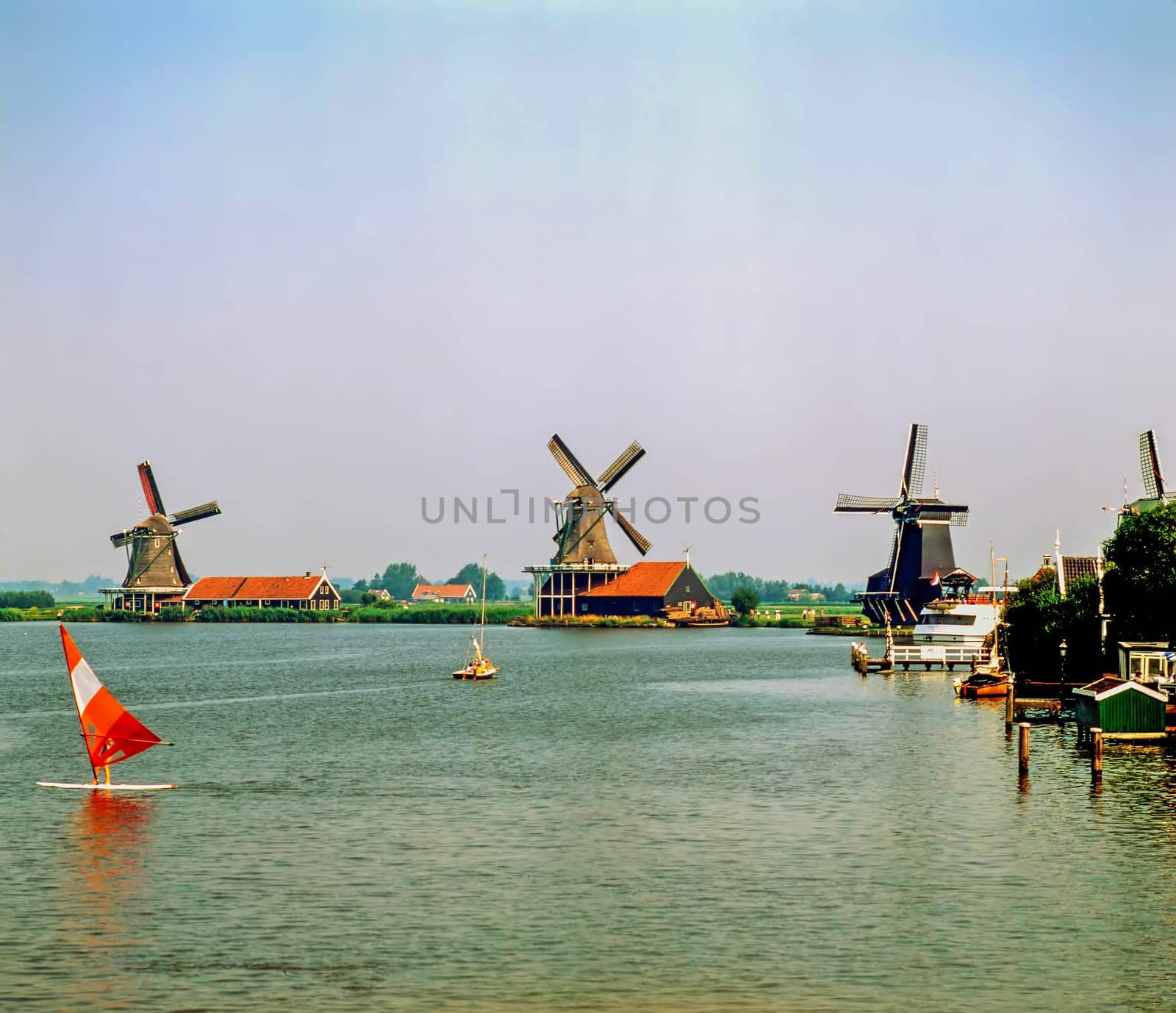 Windsurfing and windmills in Zaandam, Nethelands