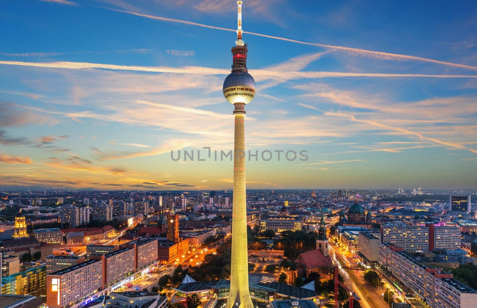 Skyline panorama of Berlin at sunset, modern buildings and bridges, Germany.
