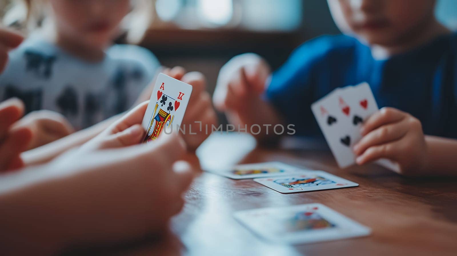 A group of children intensely focused on a card game, sharing fun and excitement in a cozy room.