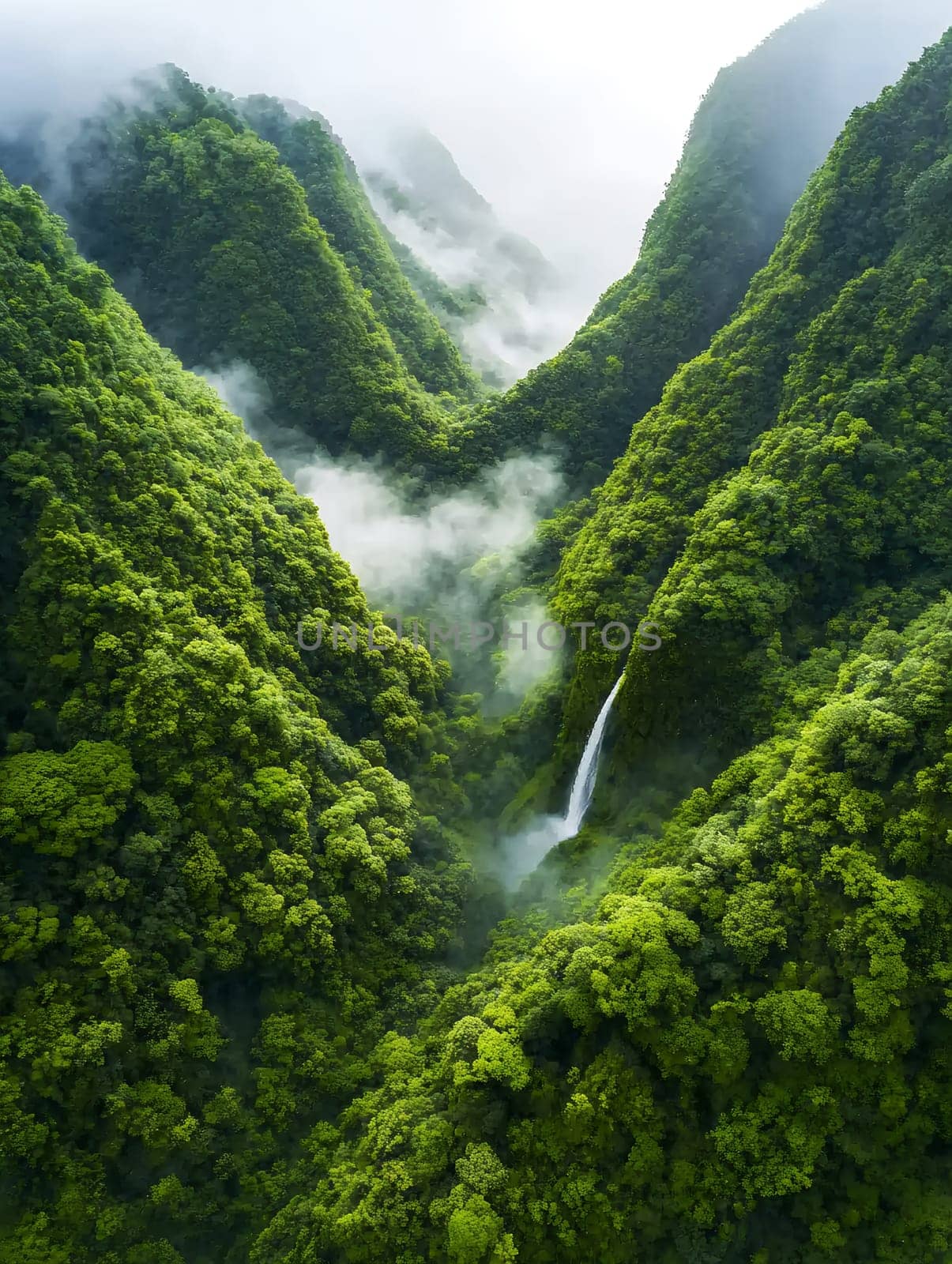 Majestic waterfall cascading through verdant mountain slopes shrouded in morning mist, surrounded by dense tropical forest canopy.