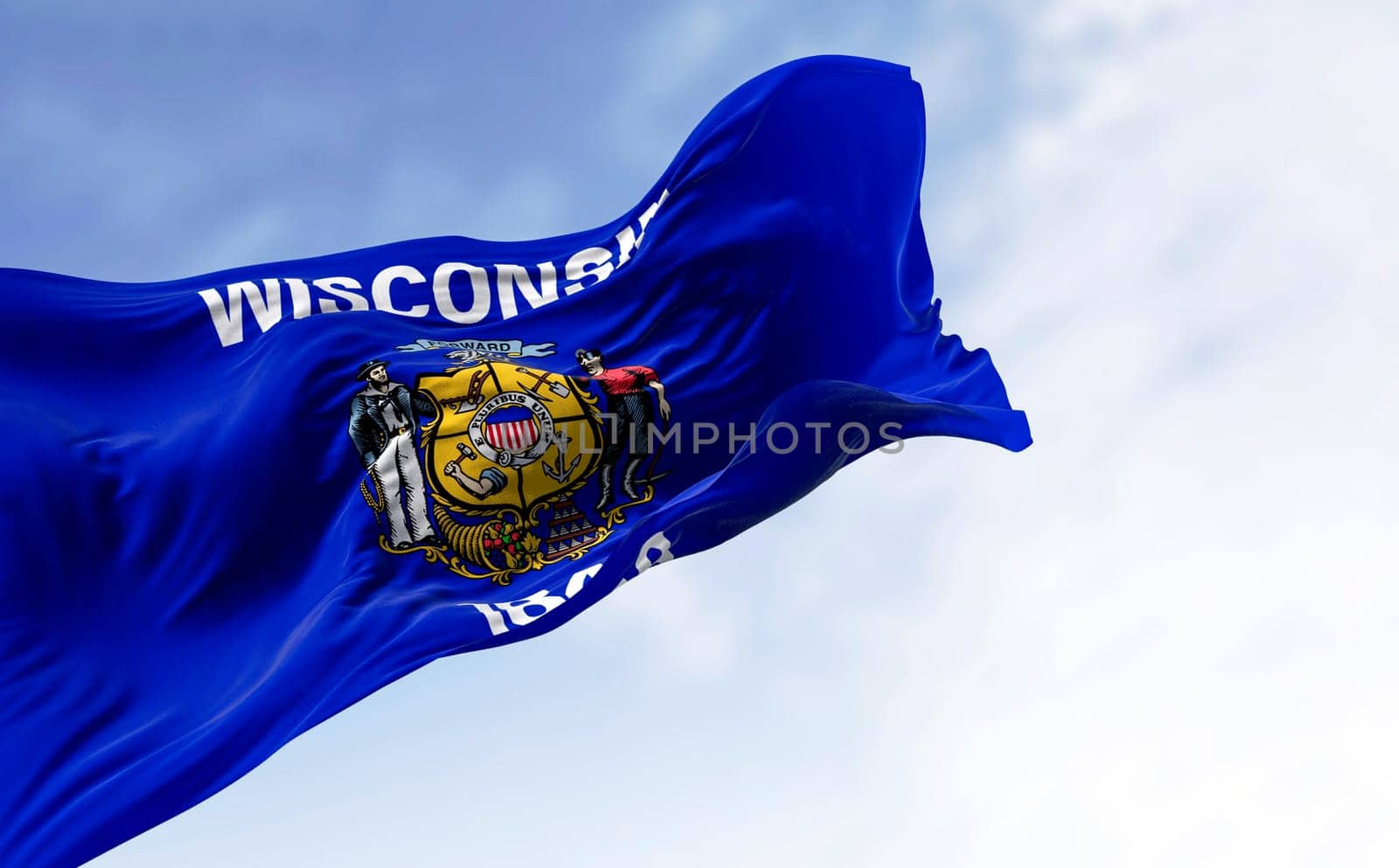 Wisconsin state flag waving in the wind. Blue flag with a central coat of arms. 3d illustration render. Rippled fabric. Textured background. Selective focus