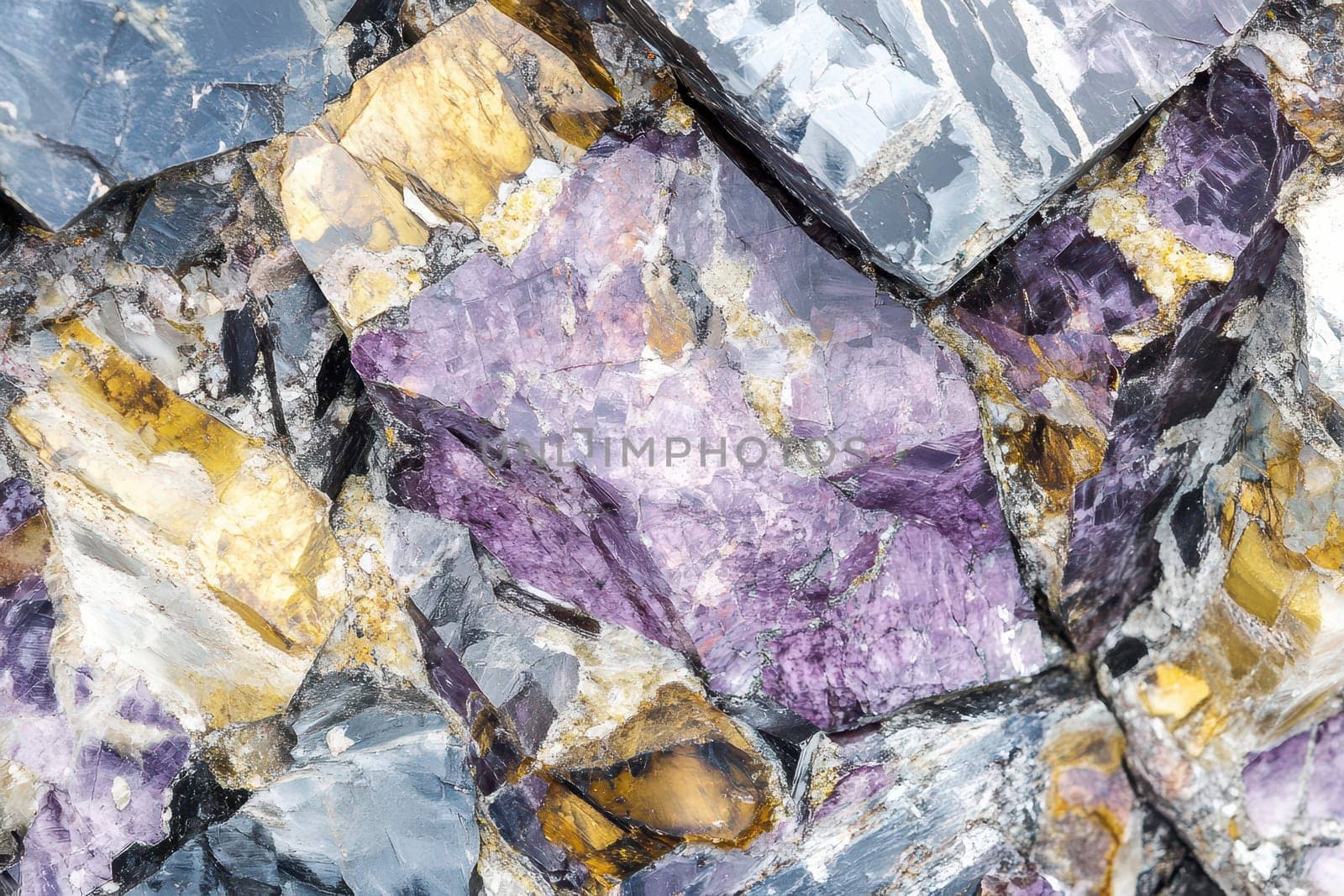 This unique mineral formation features various hues highlighting shades of purple and gold.