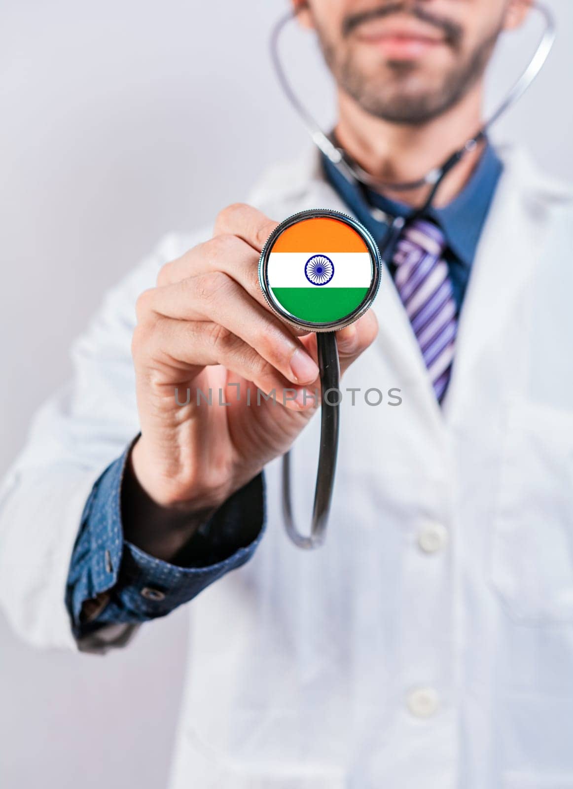 India health and medical insurance concept. Healthcare System India, doctor holding stethoscope