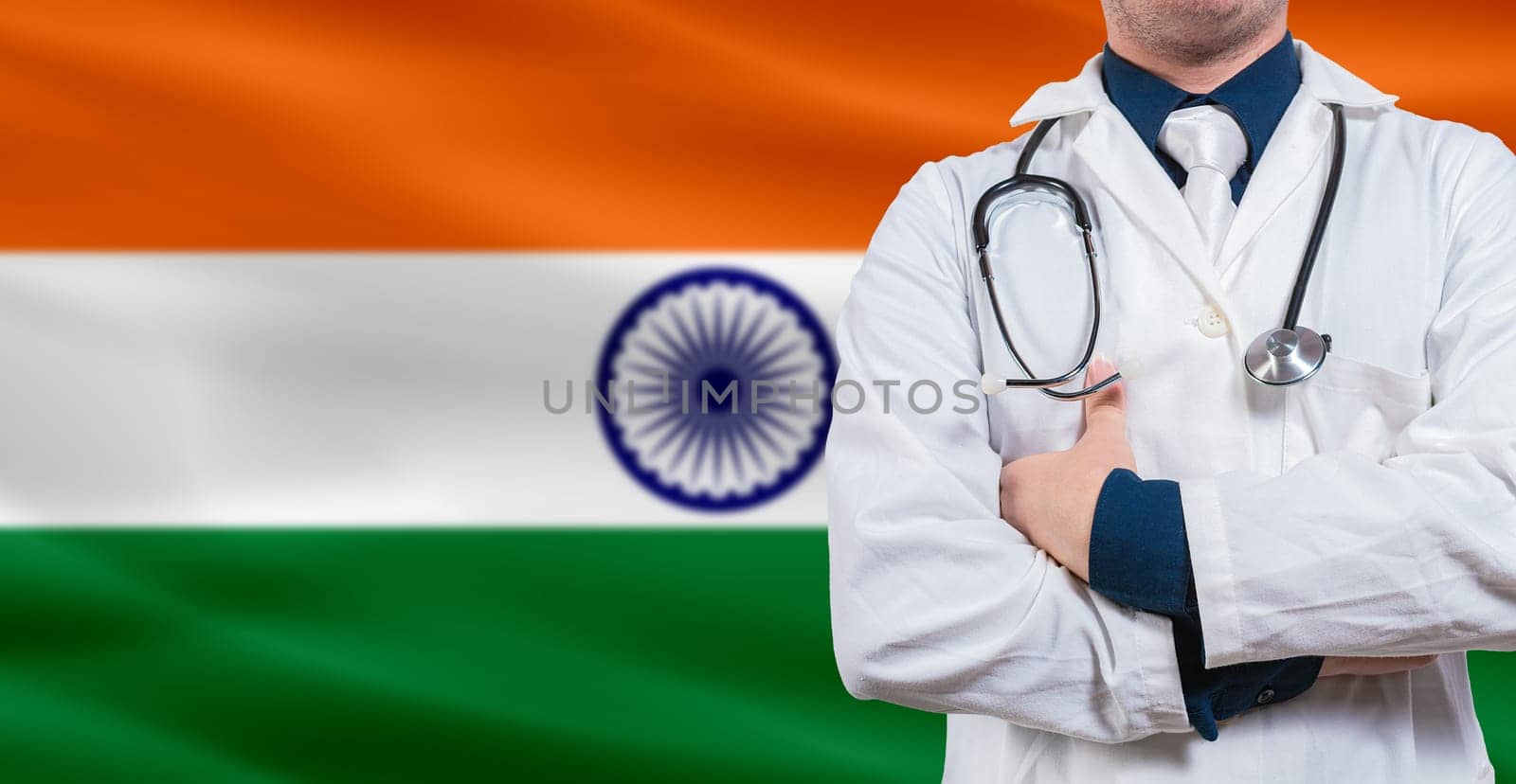 Doctor with stethoscope on India flag. Doctor holding stethoscope on India flag