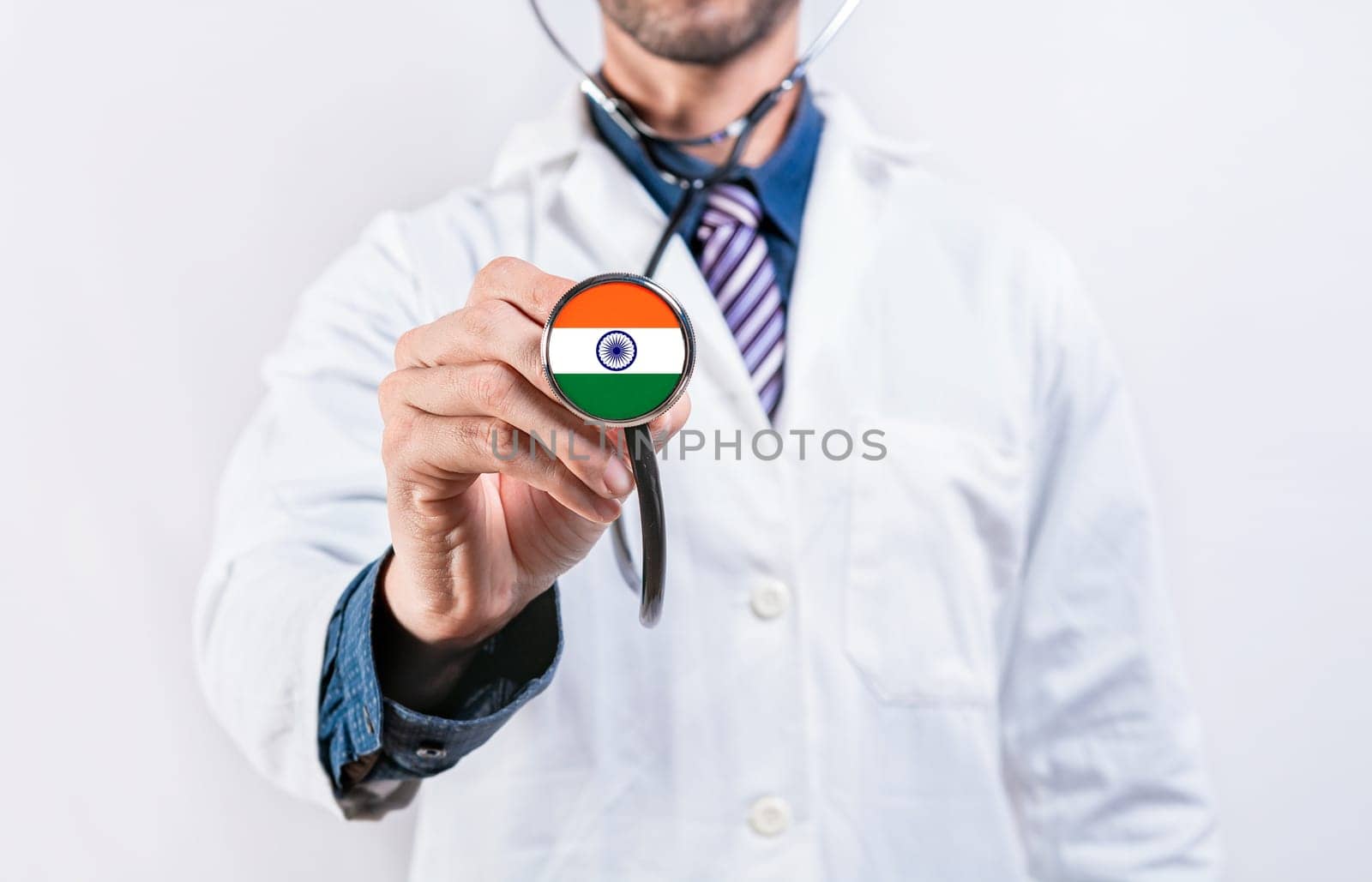 Healthcare System India, doctor holding stethoscope. India health and medical insurance concept