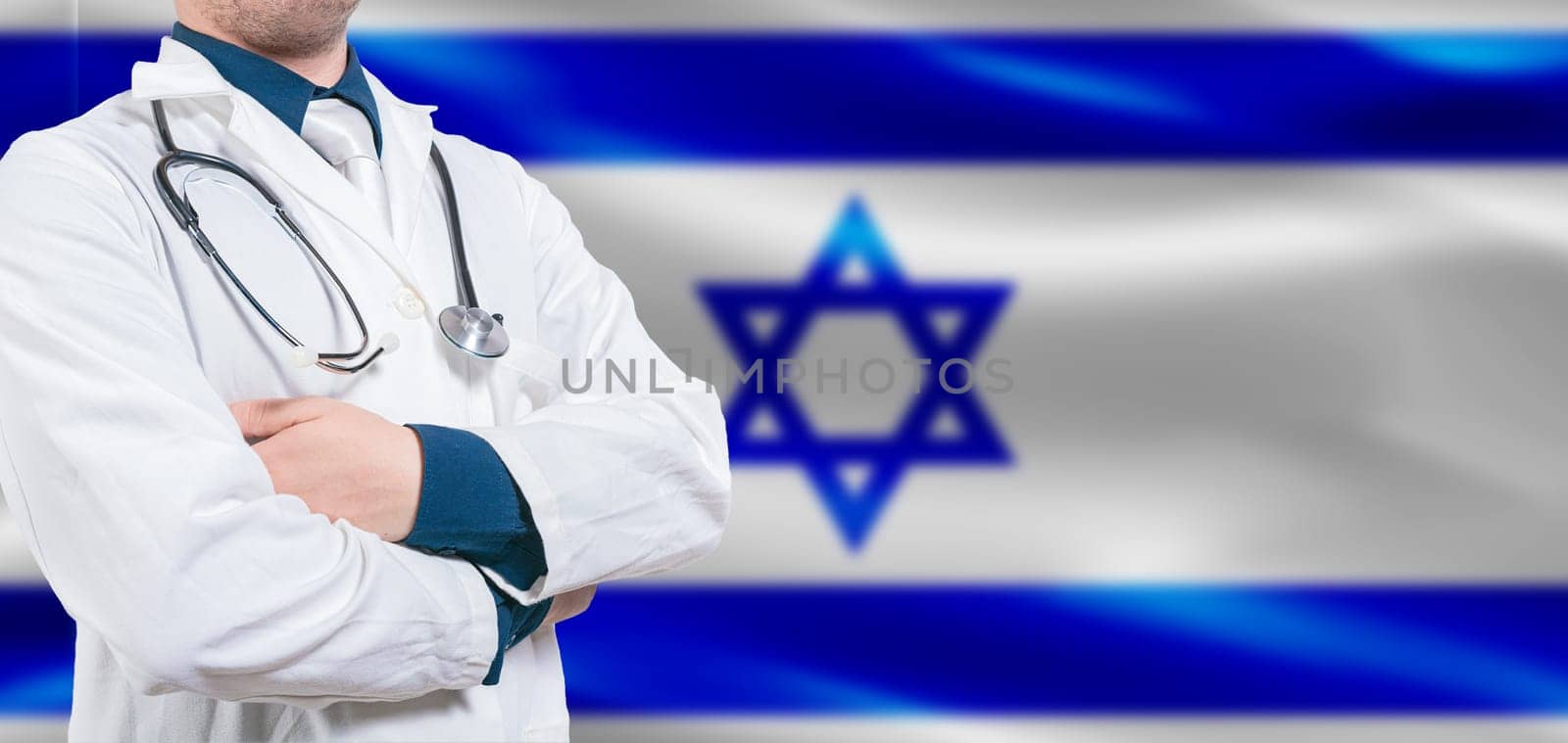 Israel Health and Care concept. Professional doctor on Israel flag. Doctor with crossed arms on Israel flag
