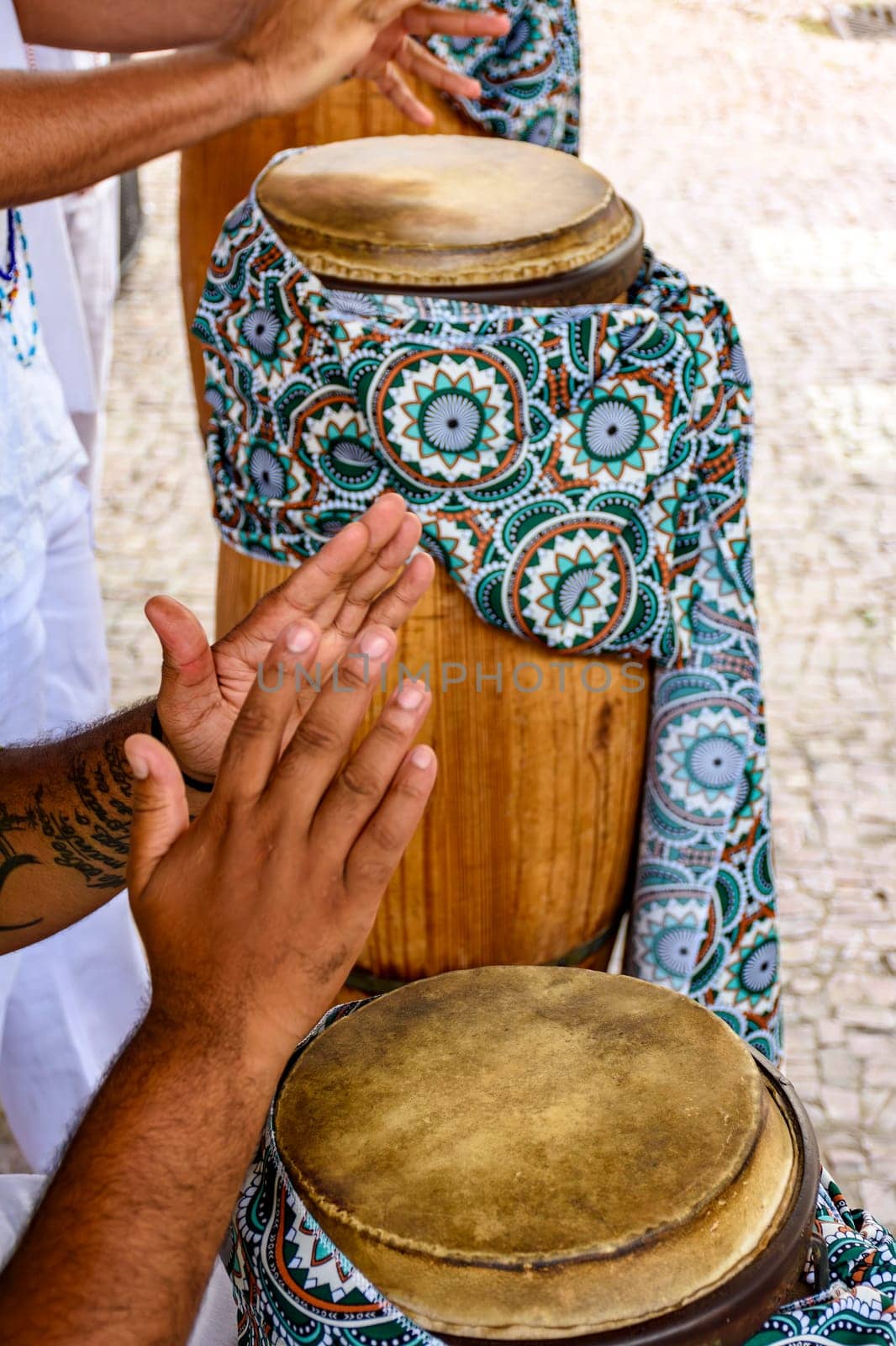 Drummers playing their instruments during a musical performance in Brazil