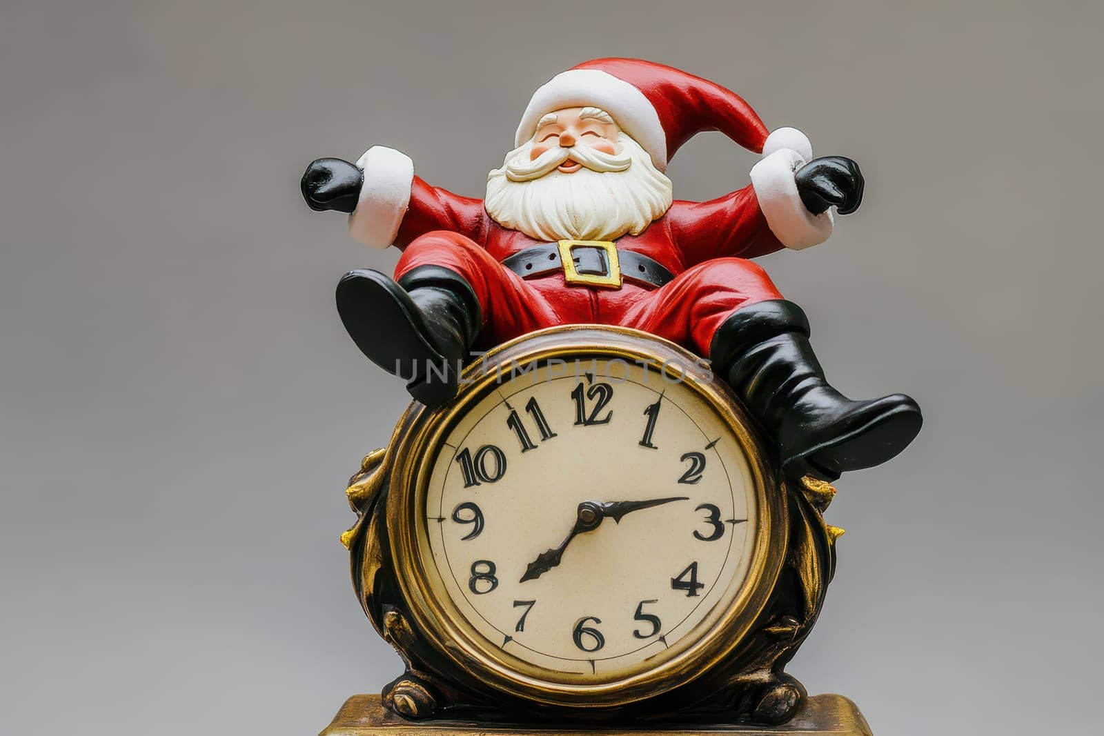 Santa Claus in a red suit joyfully sits atop a vintage clock celebrating the Christmas spirit and holiday time.