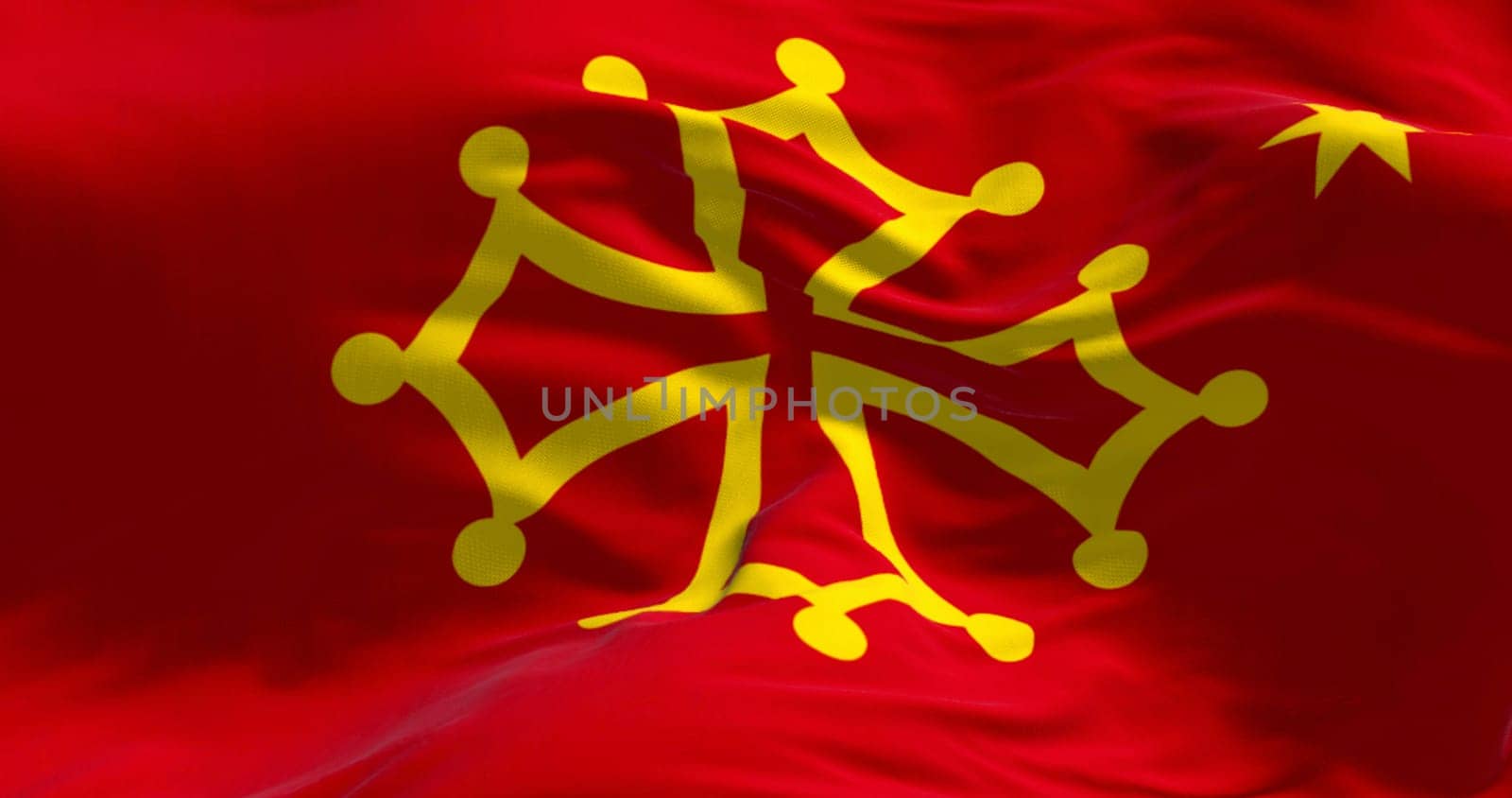 Close-up of Occitanie region flag waving in the wind. Administrative region of metropolitan France excluding Corsica. 3d illustration render. Rippling fabric. Textured background