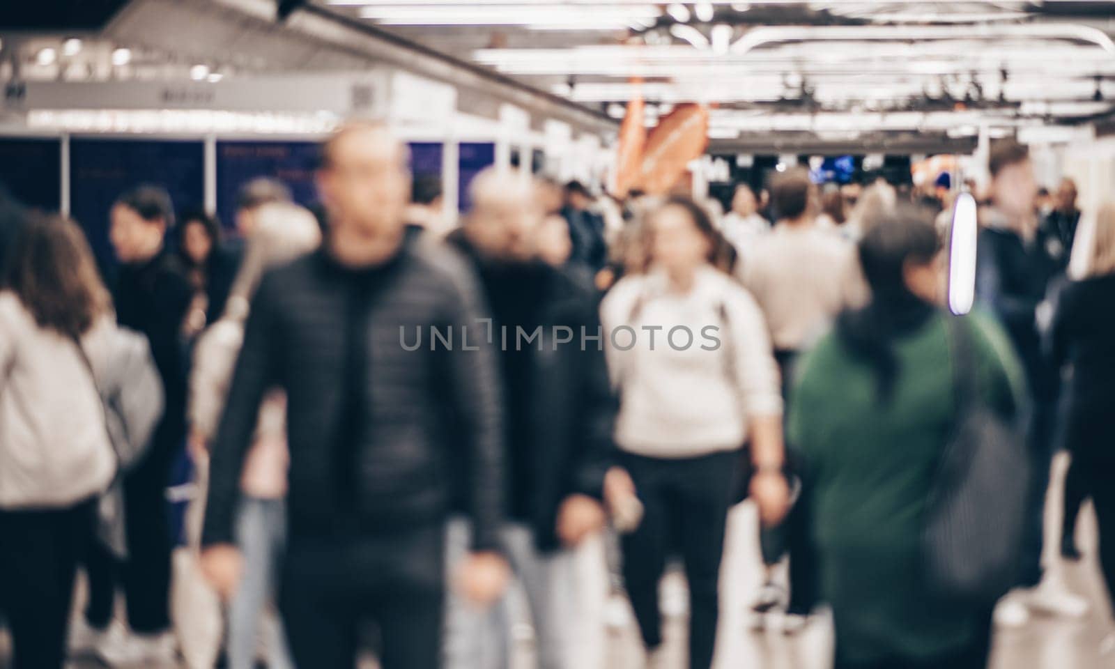 Abstract blurred people at exhibition hall of expo event trade show. Business convention show or job fair. Business concept background