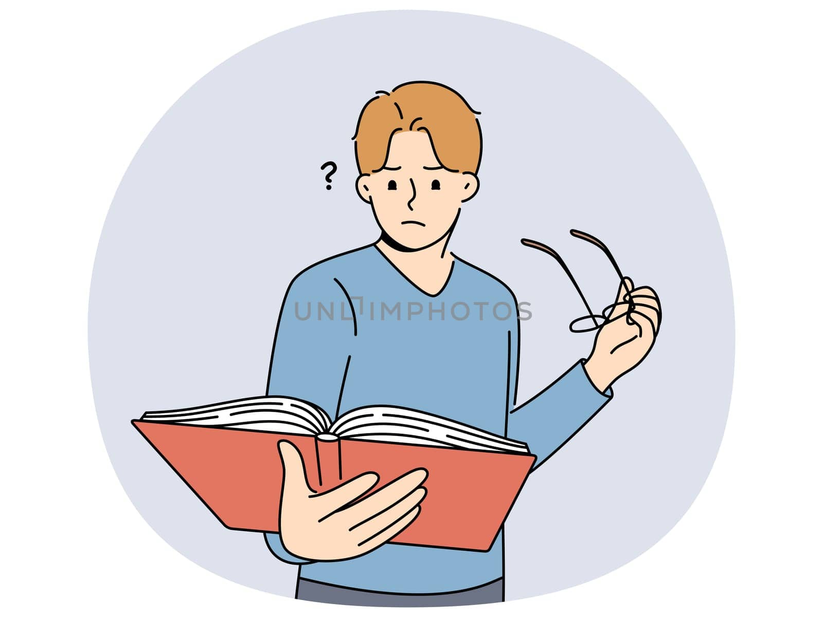 Man with book takes off glasses, trying to make out text in textbook and getting upset because of deterioration of vision. Guy is experiencing vision problems associated with excessive eye strain.