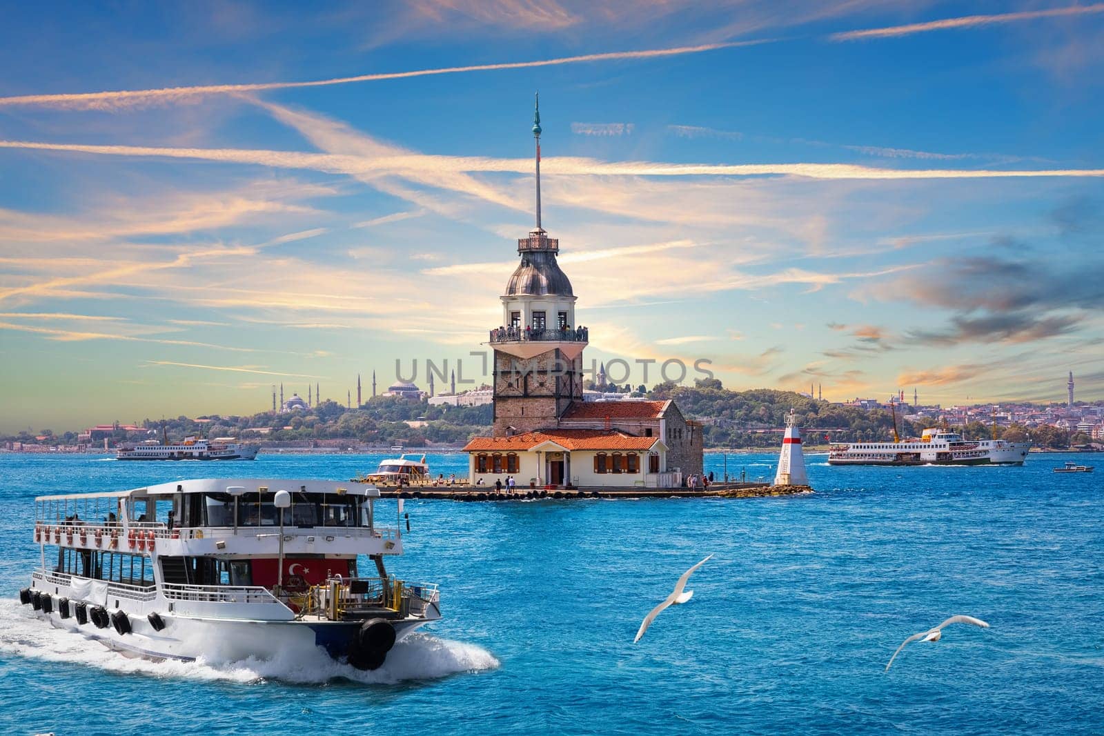 The cruise boat on the Bosphorus near the Maiden's Tower, Istanbul, Turkey.