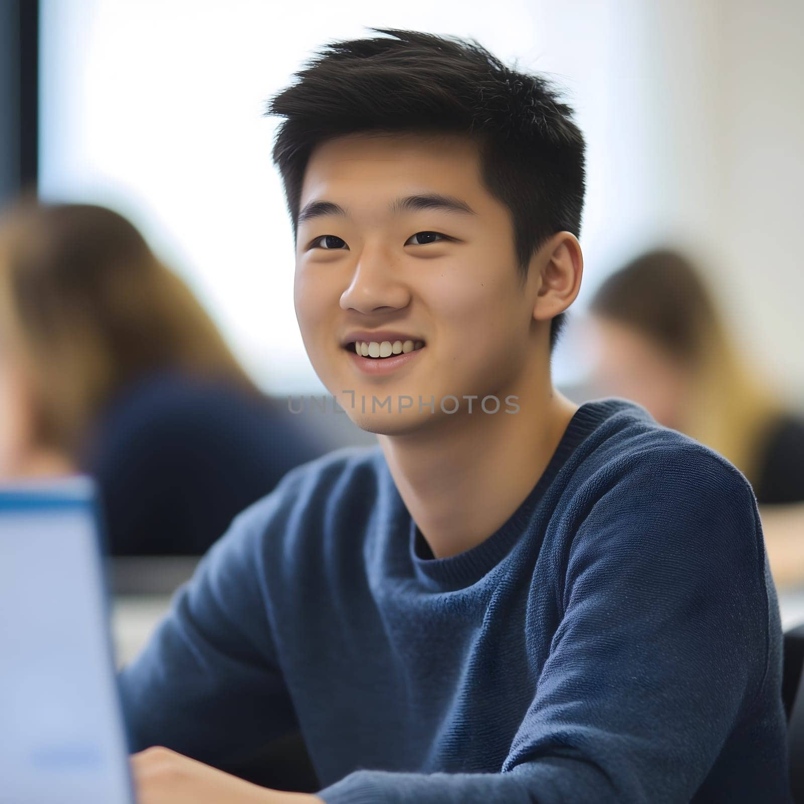Asian male student learning in school. Boy in the classroom portrait