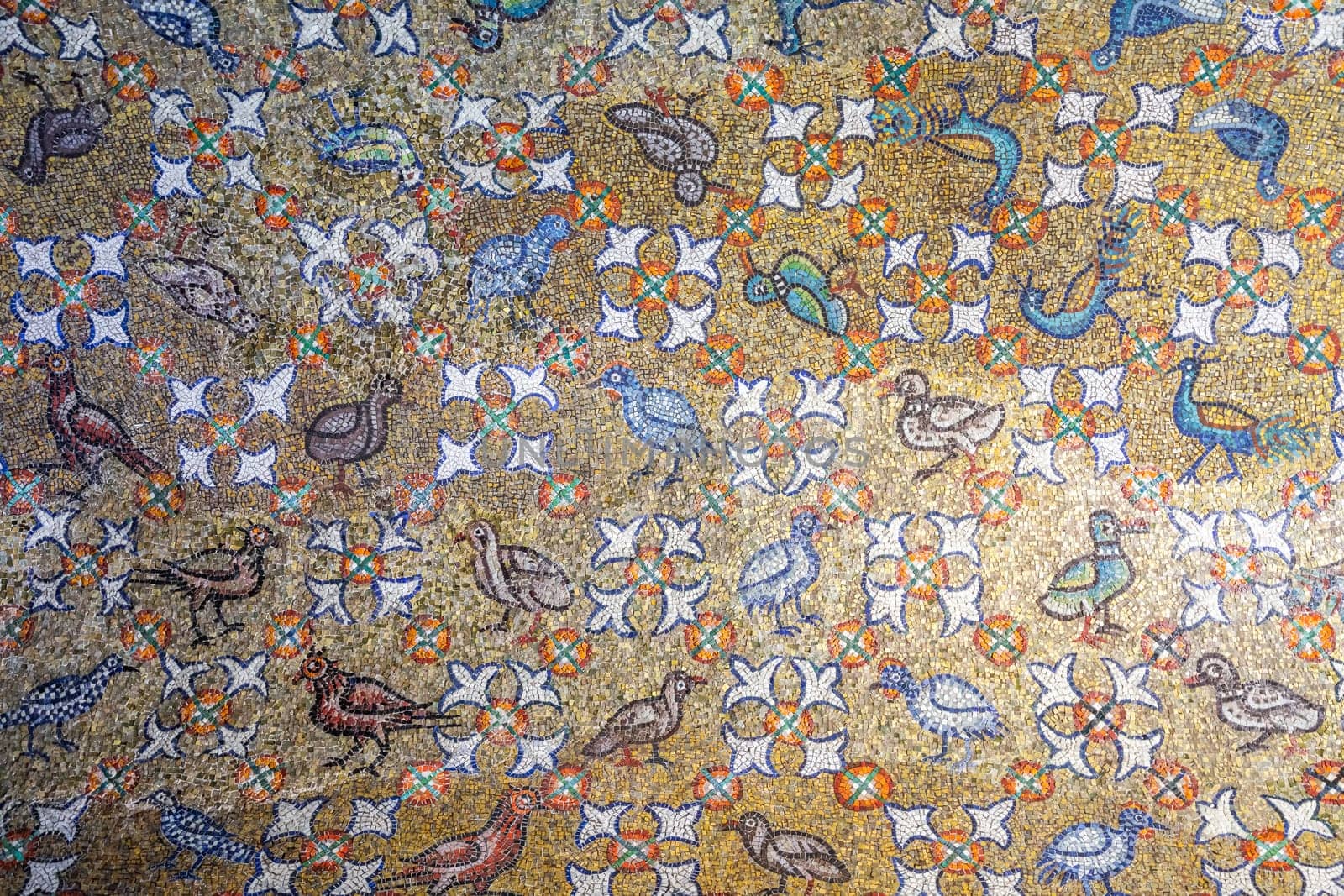 Ravenna, Italy - 12 June 2024: the Archiepiscopal Chapel and its mosaics.