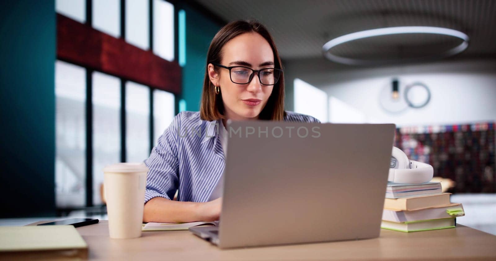Successful University Campus Learning Lifestyle. Female Studying