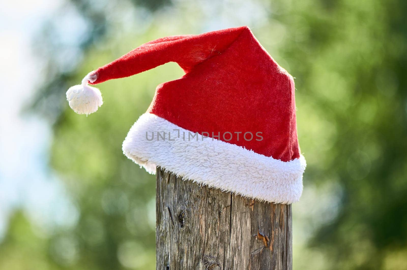 santa Claus hat is put on a pole. High quality photo