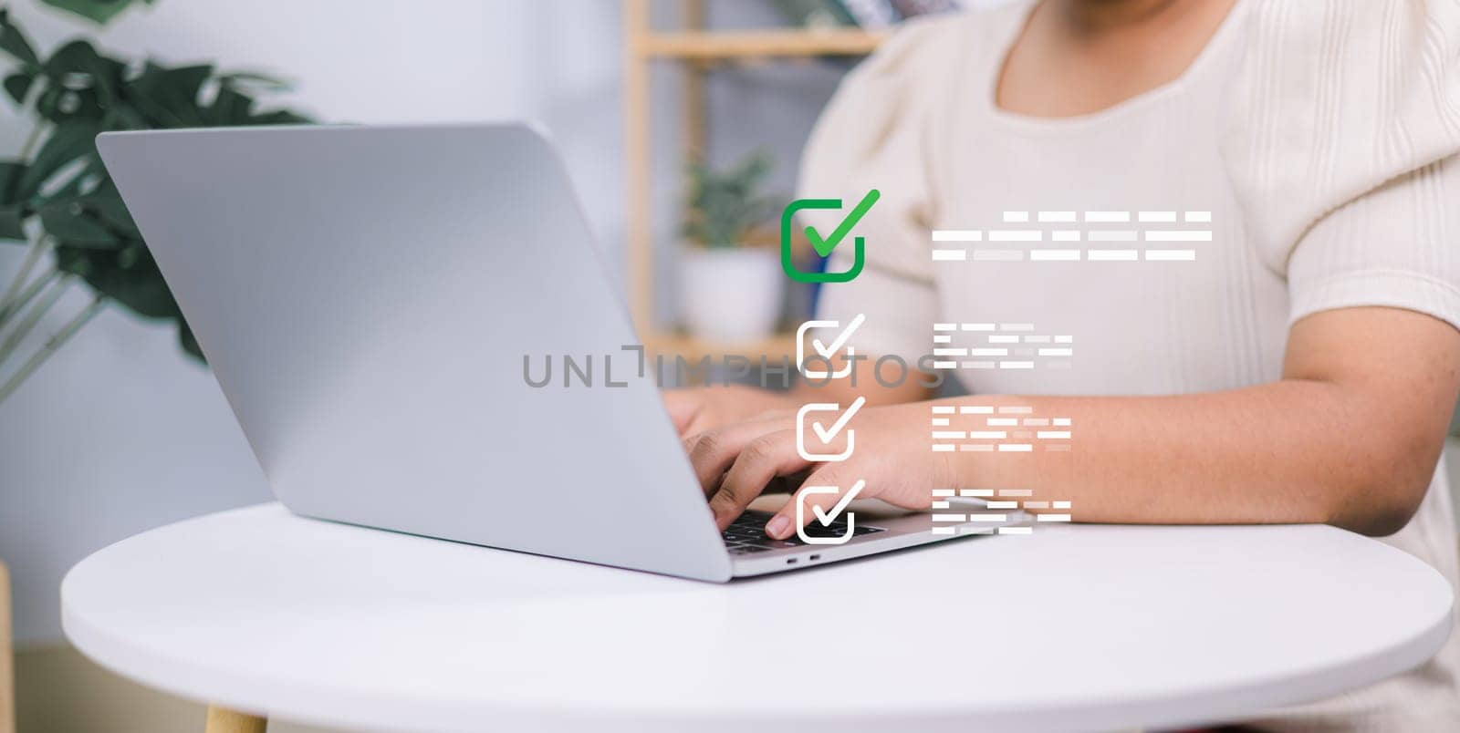 Woman working on laptop and tablet productivity checklist and filling survey form online. Document management system DMS. Assessment form, questionnaire, Checklist and clipboard task management.