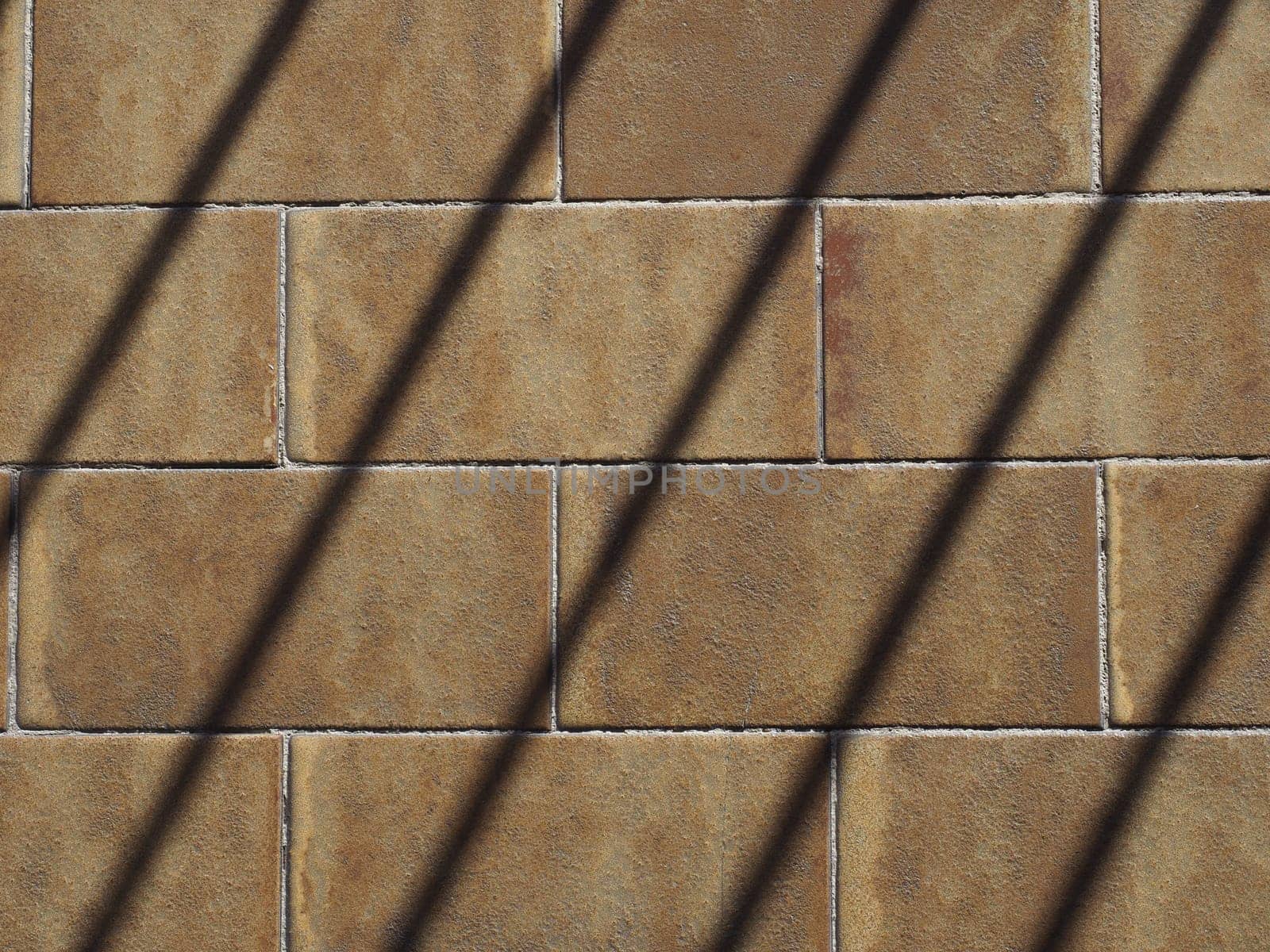prison jailhouse window bars shadow on tiled floor