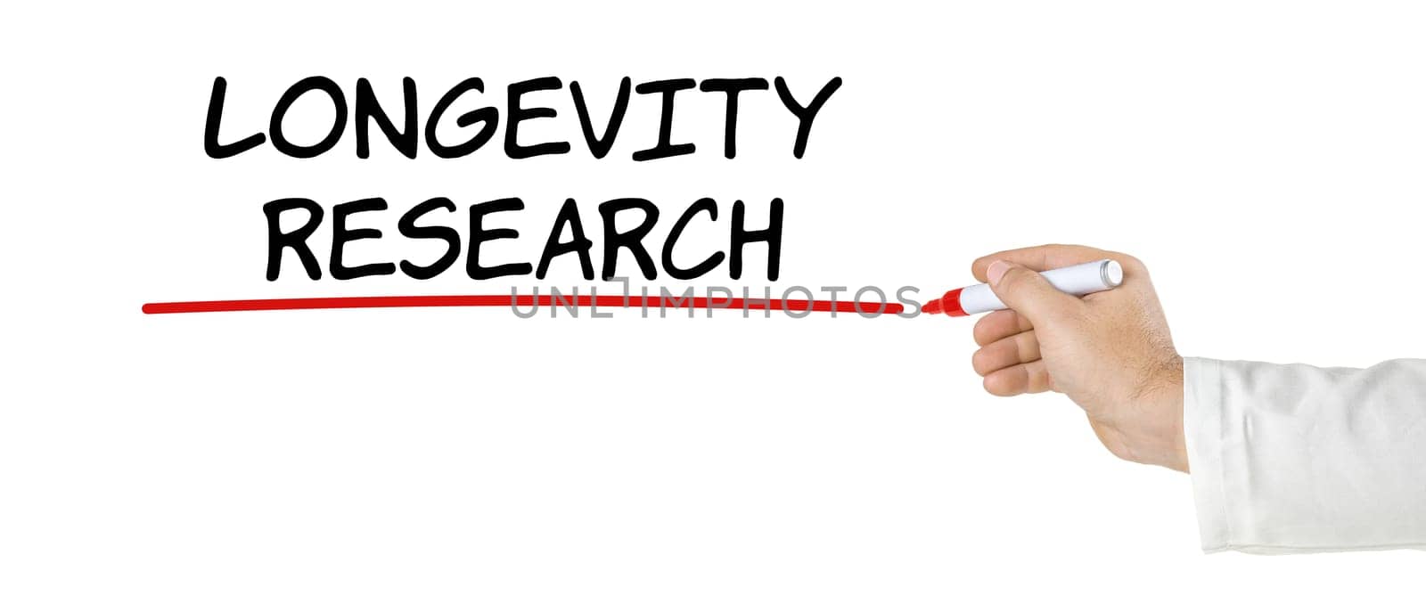 Hand with pen writing Longevity research