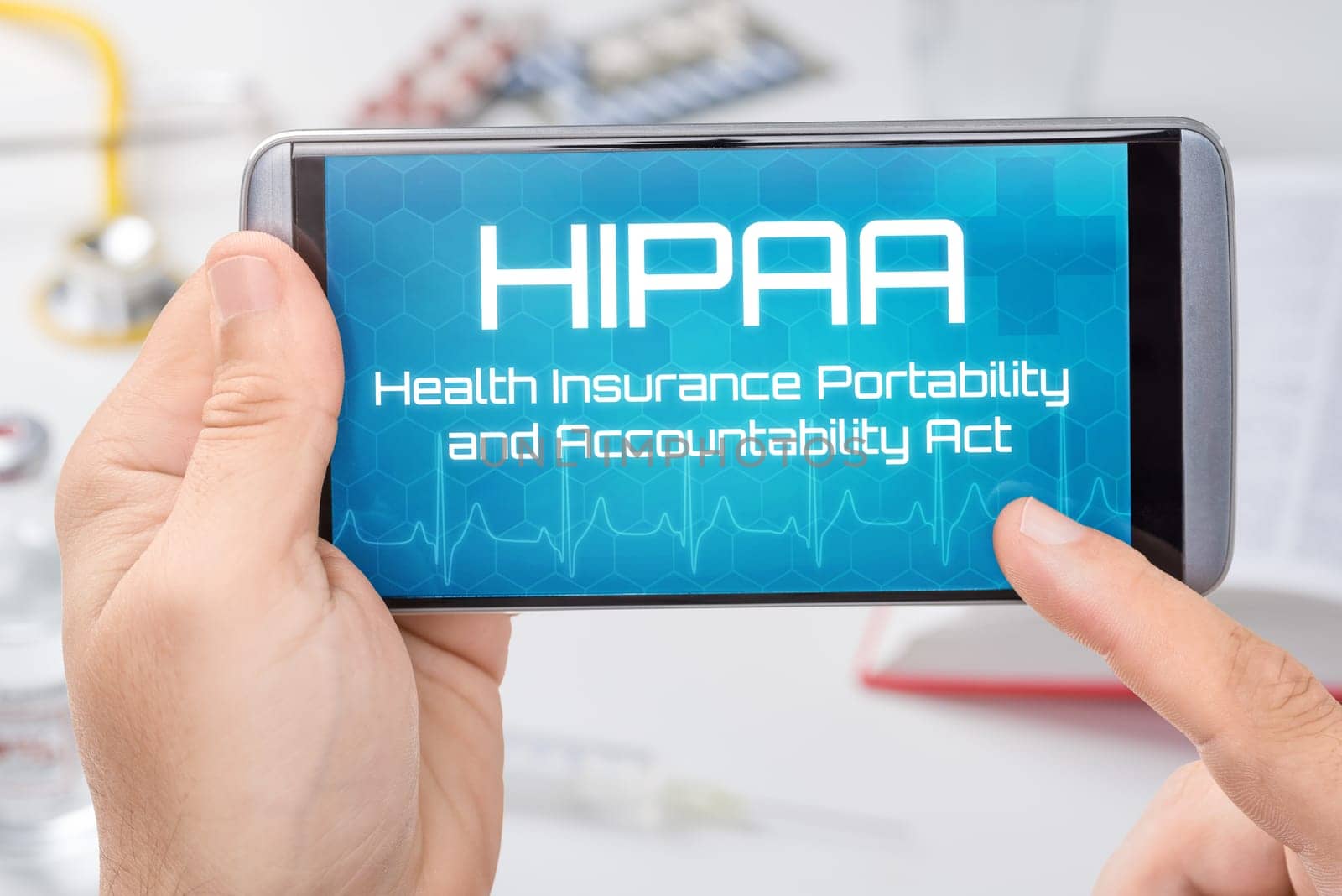 A smartphone with the text HIPAA