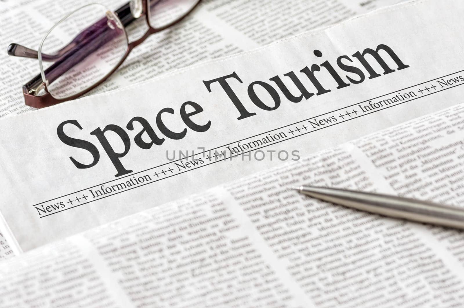 A newspaper with the headline Space Tourism