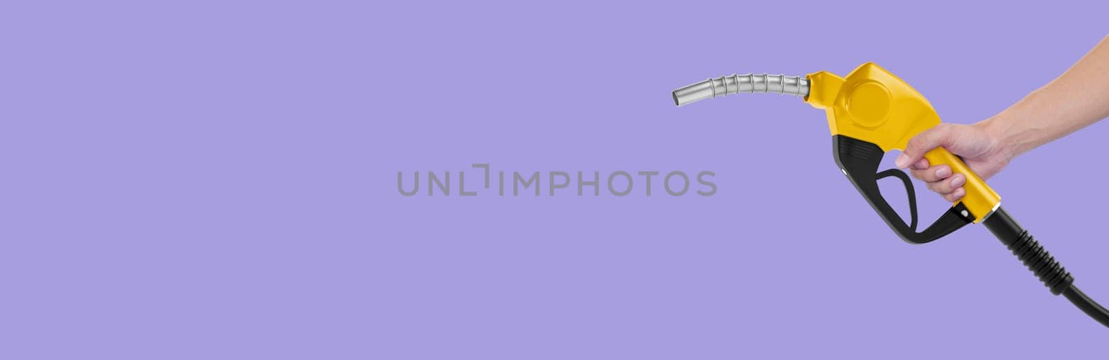 Hands holding Fuel nozzle on light purple background