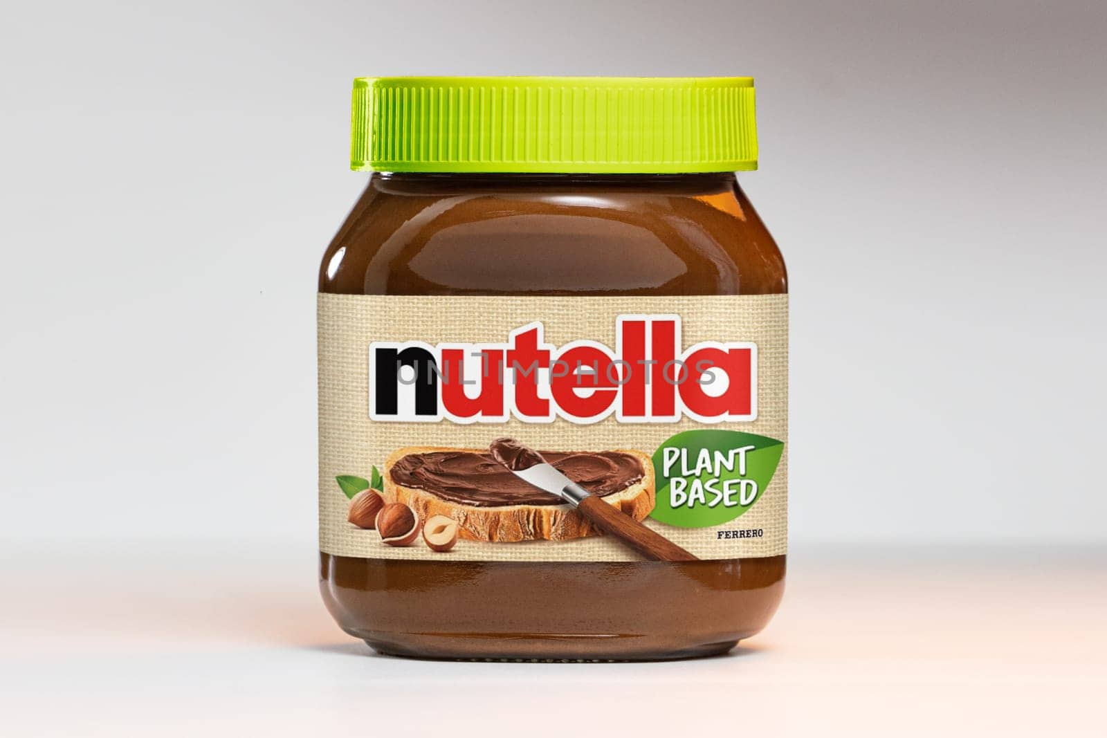 AACHEN, GERMANY - NOV 07, 2024: Pot of vegan plant based Nutella, the popular brand name of a sweetened hazelnut cocoa spread, introduced to the market in 1964 by Italian company Ferrero