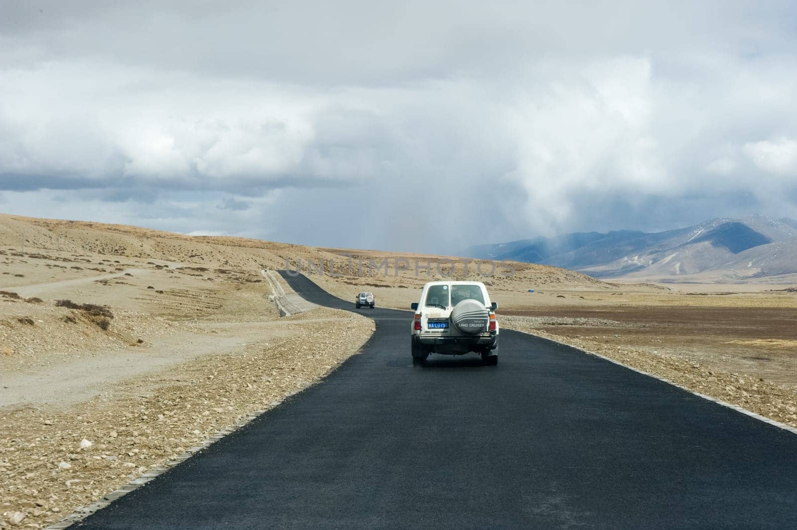 Naku, Nepal - June 23, 2016: Asphalt road in Tibet. The track in the Himalayas.