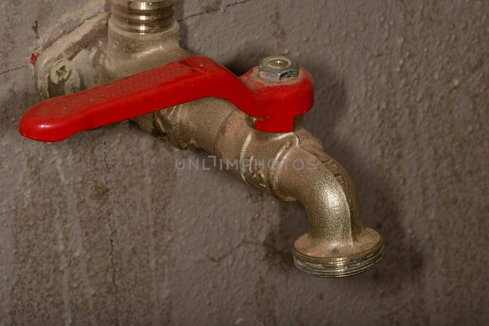 old water tap in a cellar