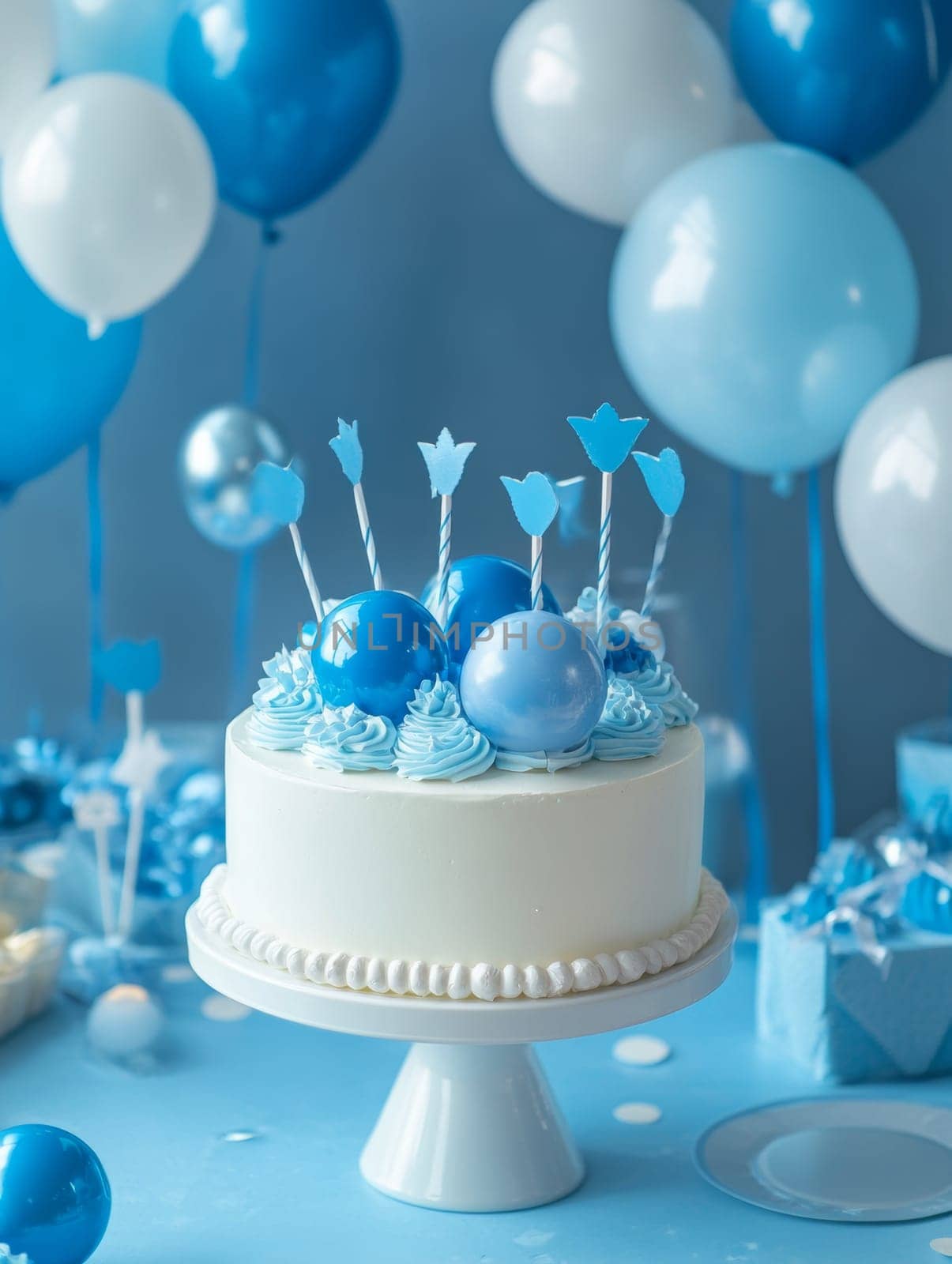 Elegant blue-themed cake with balloons, perfect for birthdays or special occasions, creating a festive atmosphere.