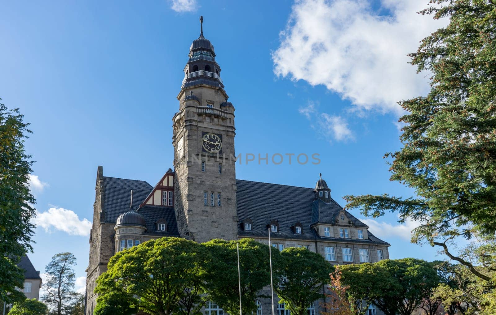 Town hall in Wittenberge, Barndenburg, Germany with blue sky and white clouds