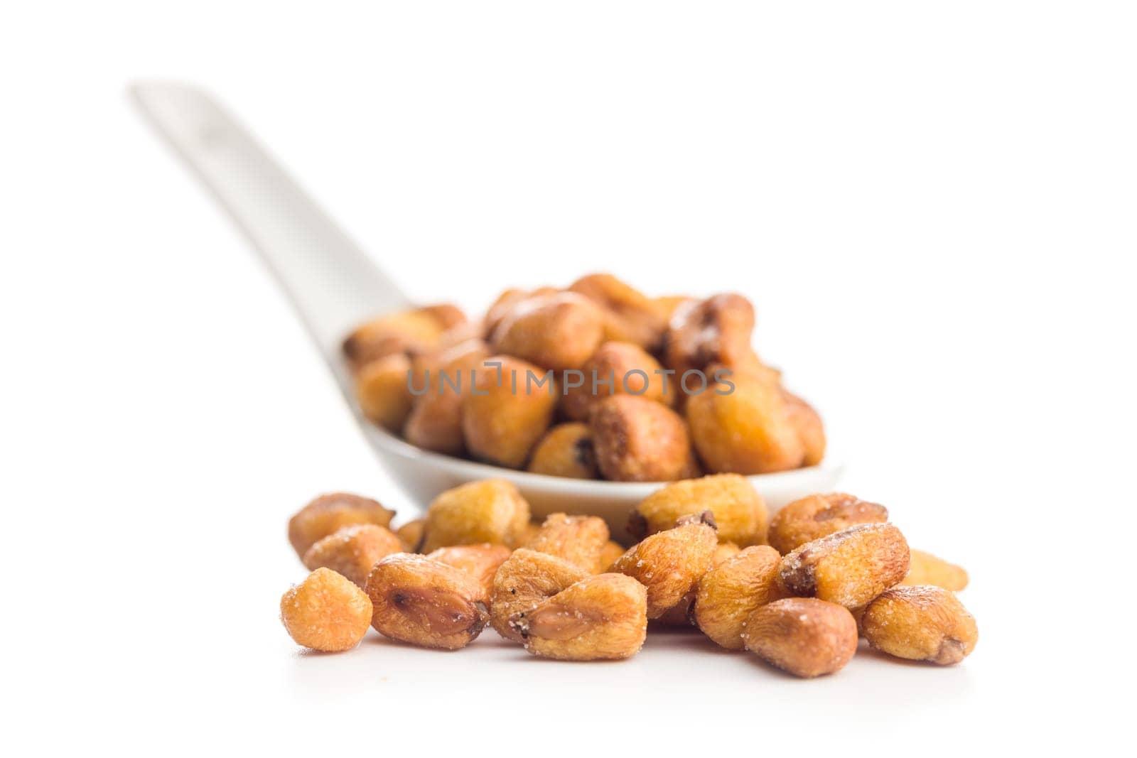 Roasted salted corn snack isolated on a white background.
