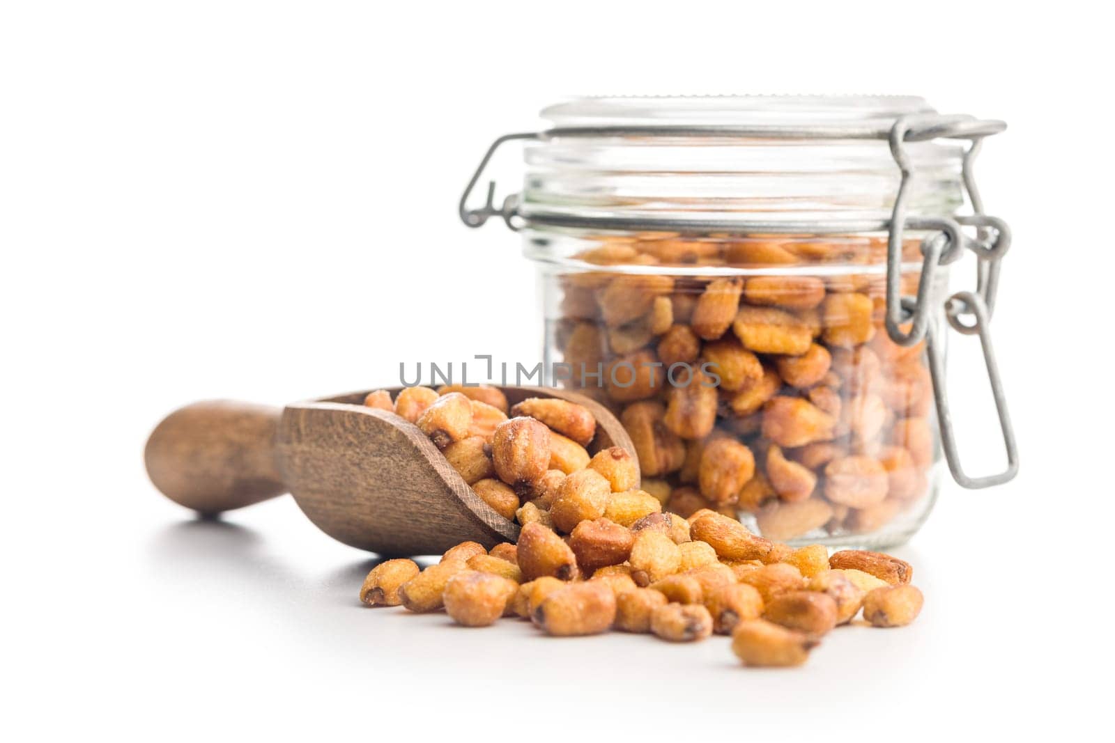 Roasted salted corn snack in scoop  isolated on a white background.