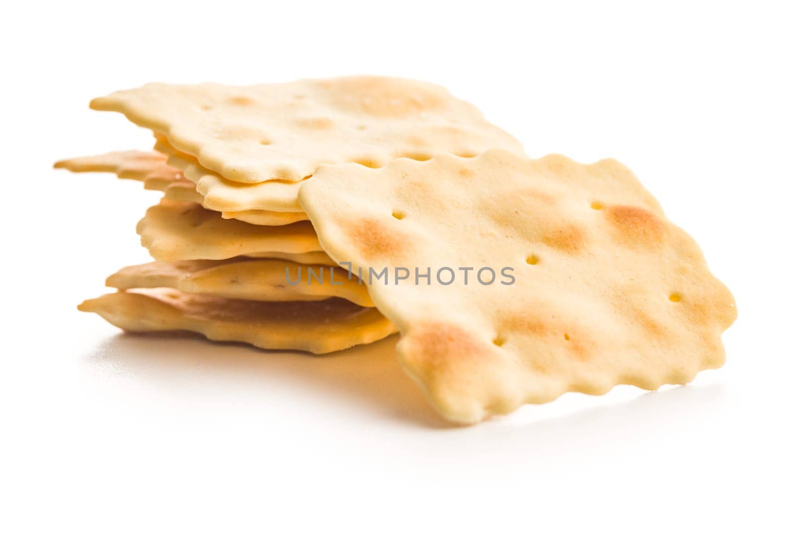 A crispy salted crackers isolated on a white background.