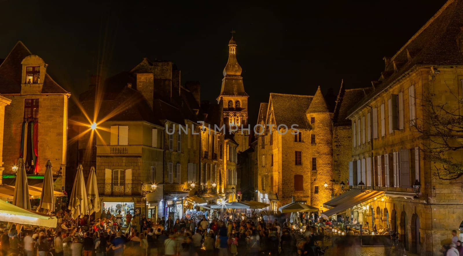 Sarlat-la-Caneda, France - August 19, 2024: Night in Sarlat la Caneda a beautiful medieval town and one of the highlights to a visit to the Dordogne Perigord