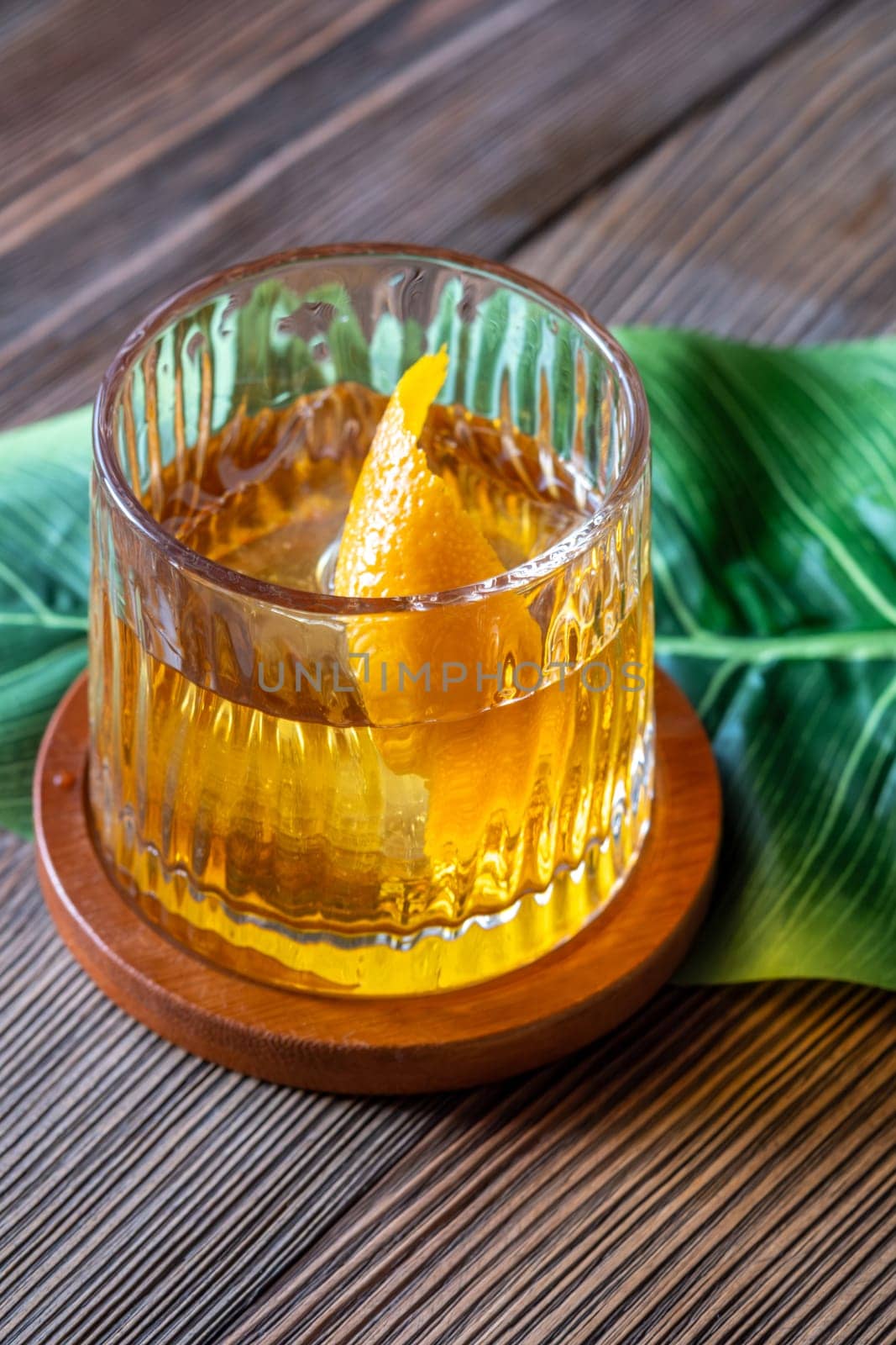 Banana Old Fashioned with orange zest garnish